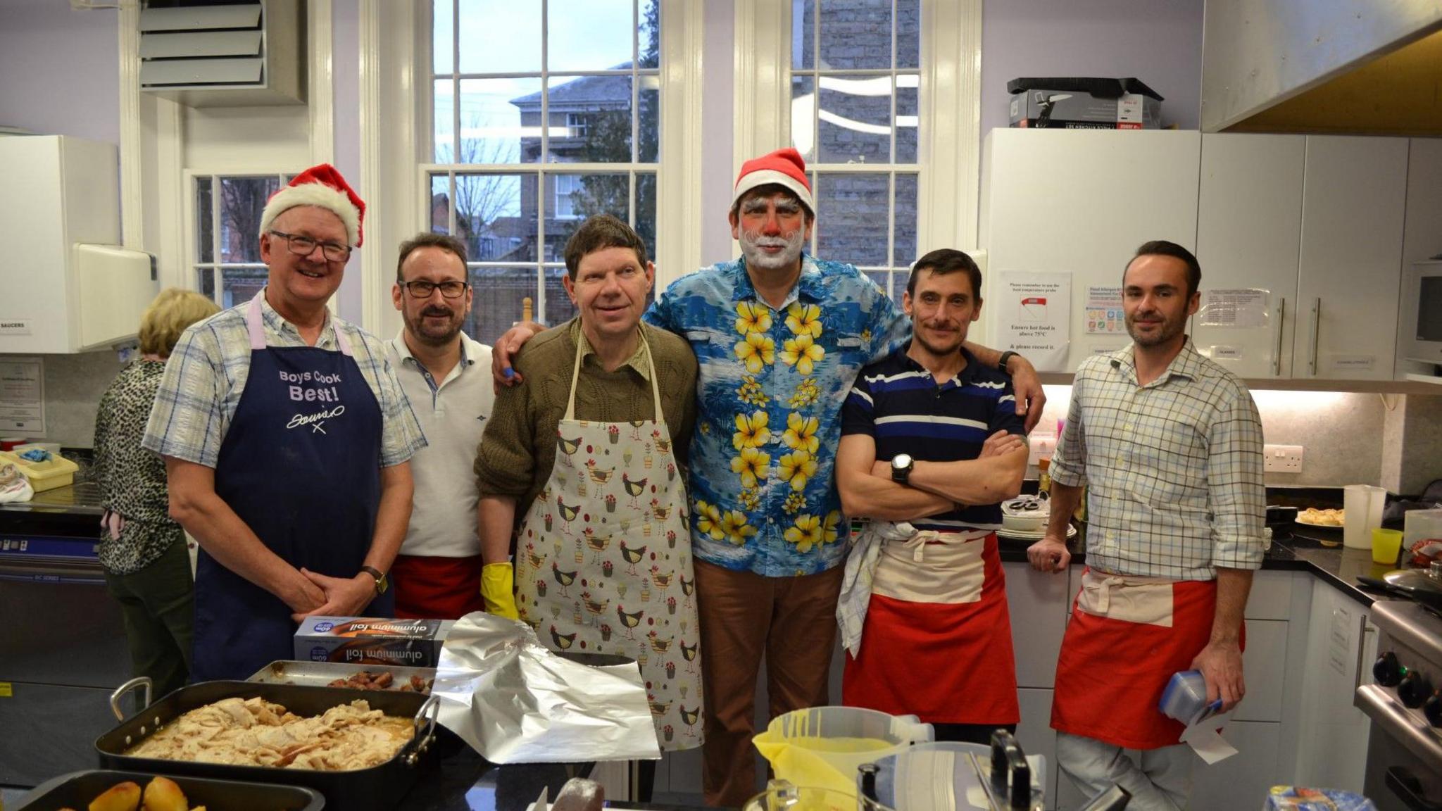 Simon Thompson with several of the volunteers at a previous Hadleigh Christmas Present Trust event