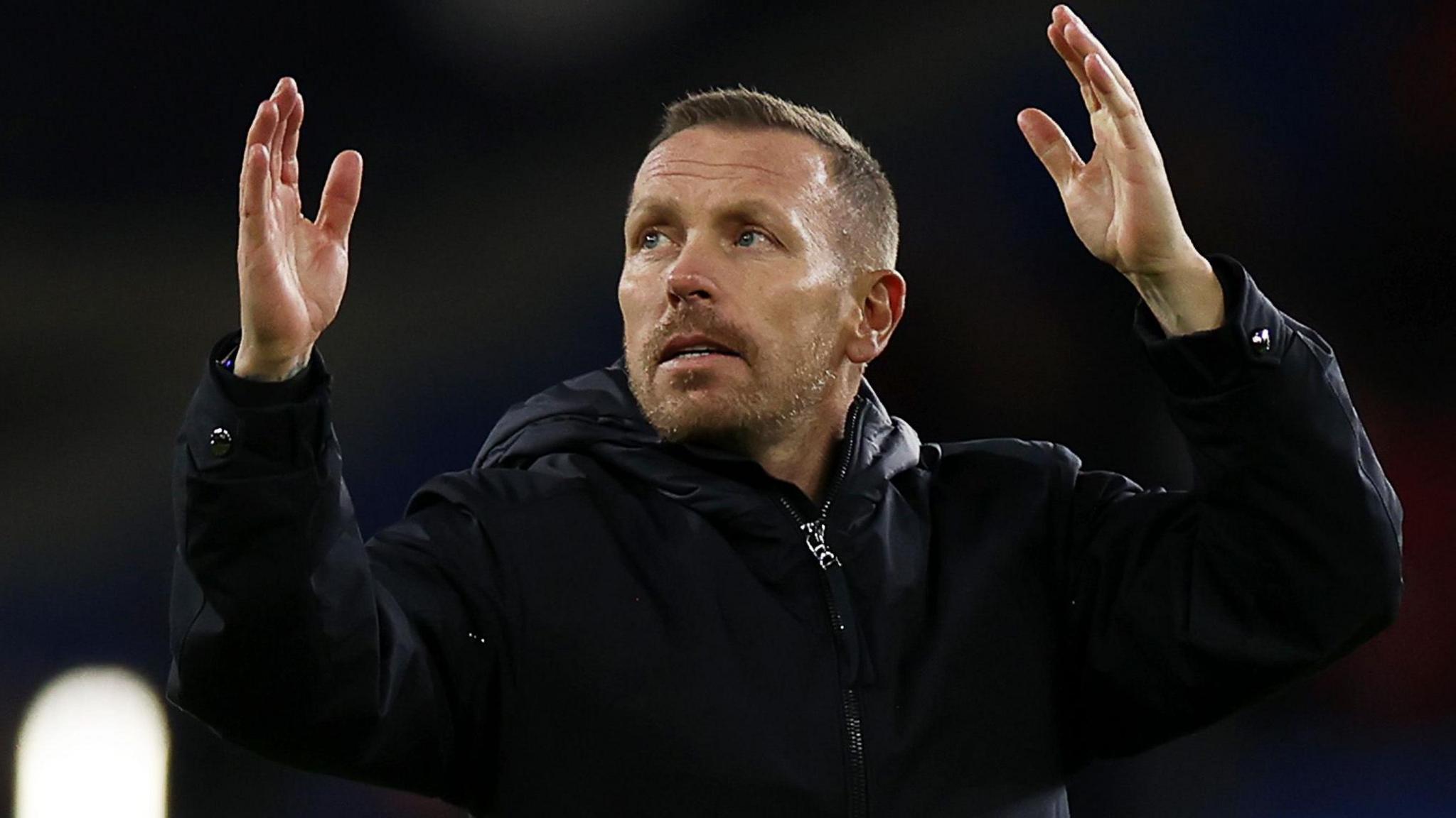 Craig Bellamy applauds the Cardiff City Stadium crowd