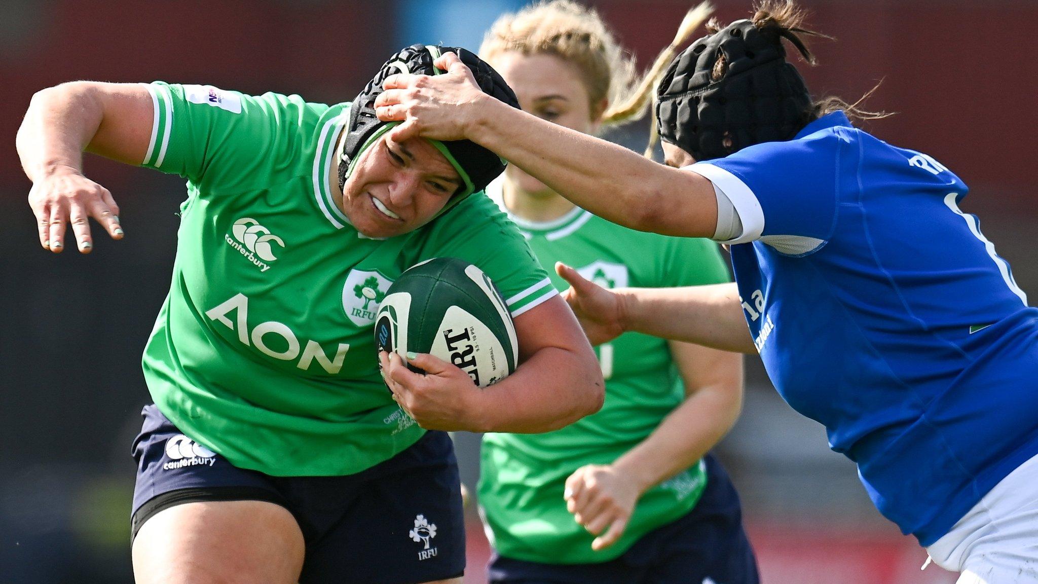 Ireland prop Christy Haney is tackled by an Italian defender in Sunday's Six Nations match in Dublin