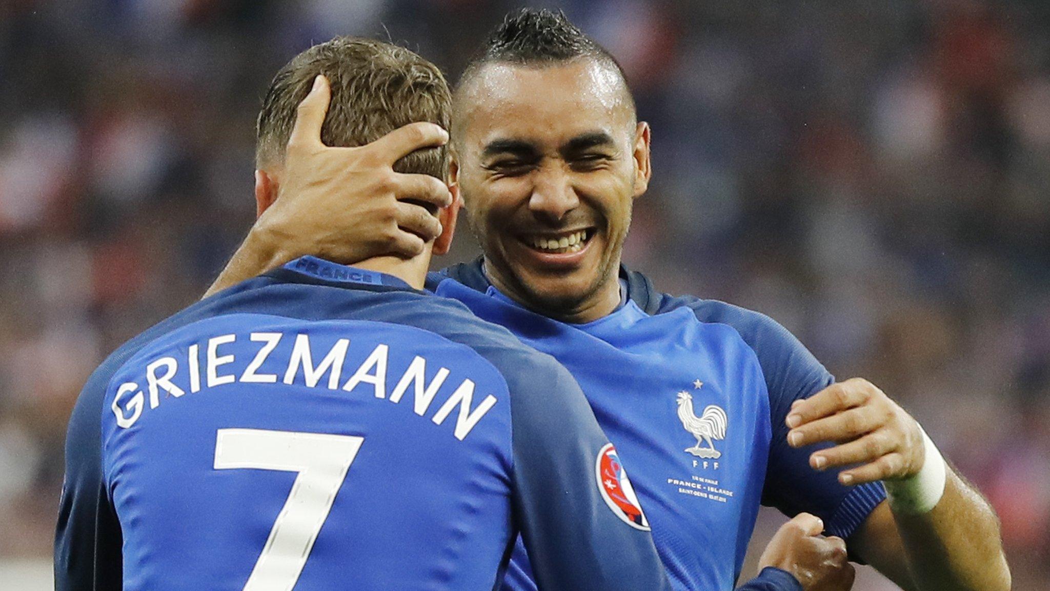 Dimitri Payet celebrates with Antoine Griezmann