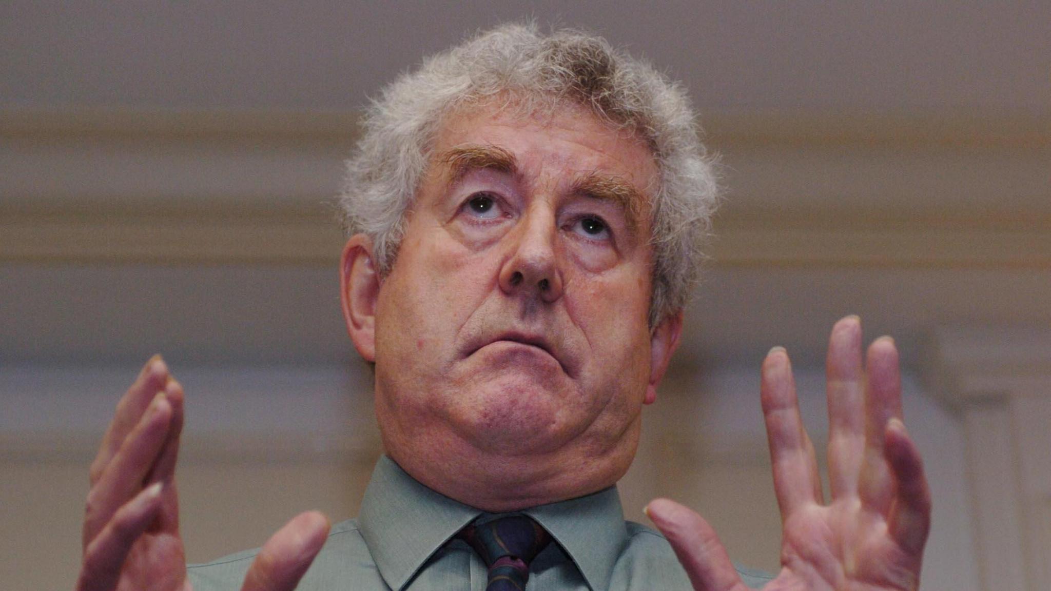 Rhodri Morgan with his hands held aloft