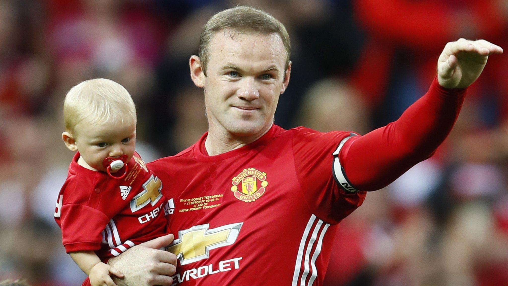 Manchester United and England captain Wayne Rooney waves to the crowd at his testimonial match at Old Trafford