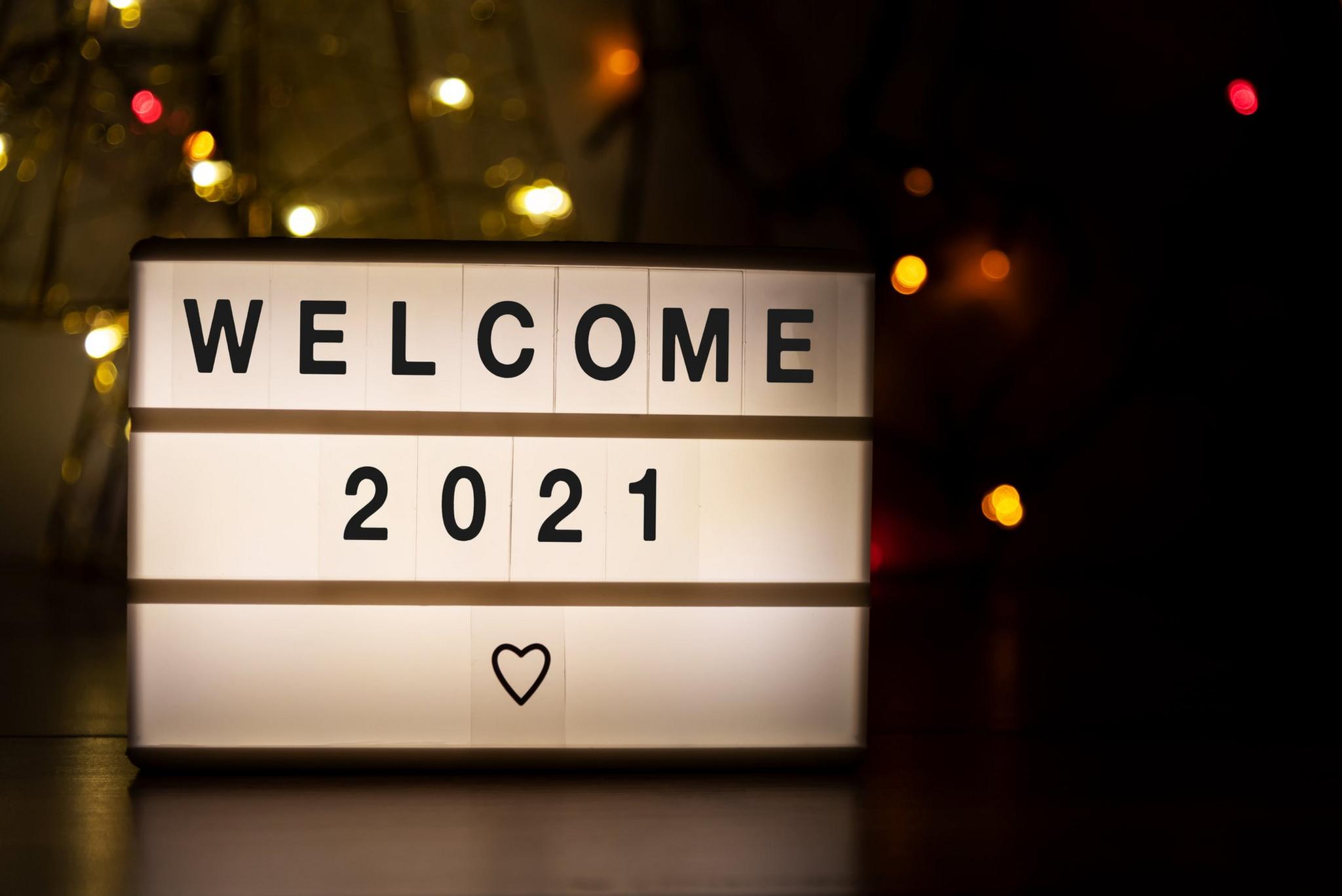 A lightbox shows the message "Welcome 2021"