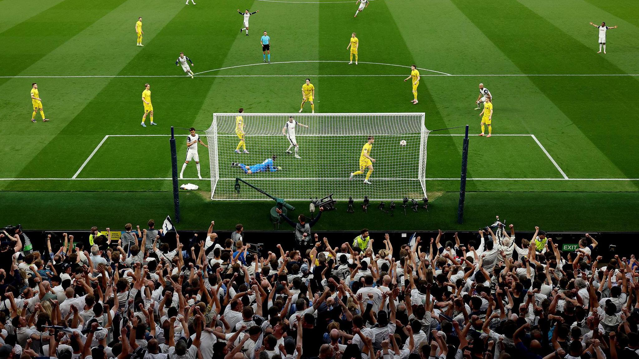 Tottenham Hotspur's Brennan Johnson scores his team's first goal past Bodo/Glimt's Nikita Haikin during the UEFA Europa League 2024/25 Semi Final First Leg match