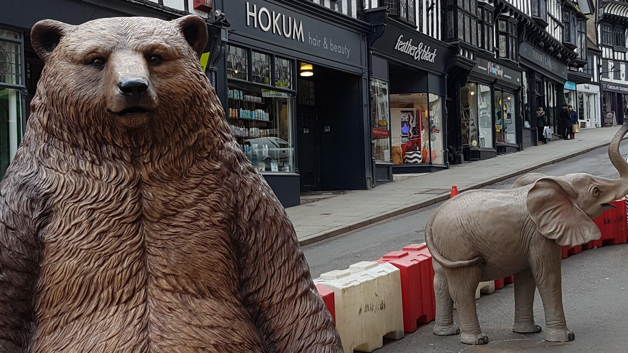 A fibre glass bear and baby elephant in Wyle Cop