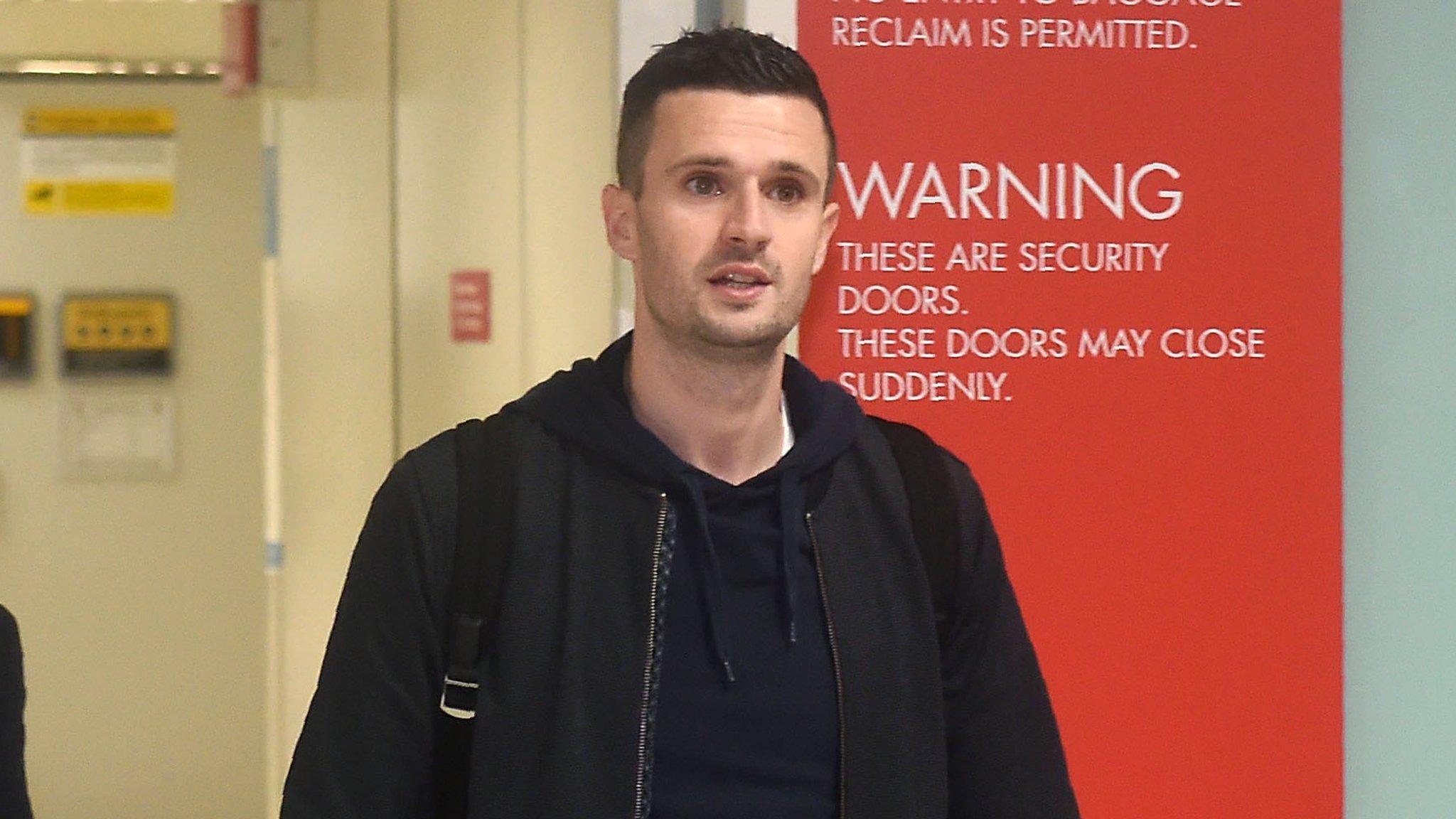 Jamie Murphy at Glasgow Airport on Thursday