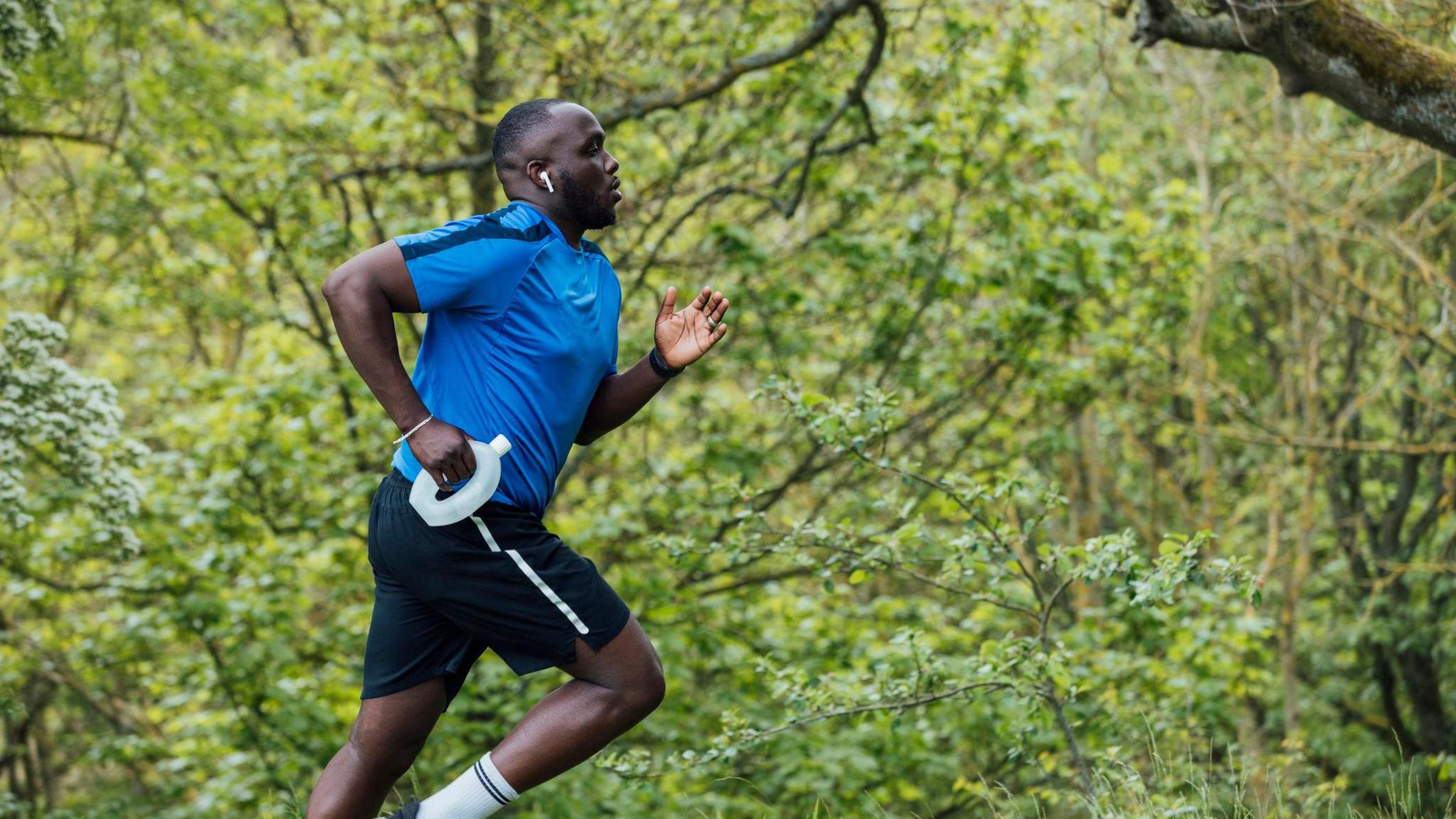 Man runs in a park 