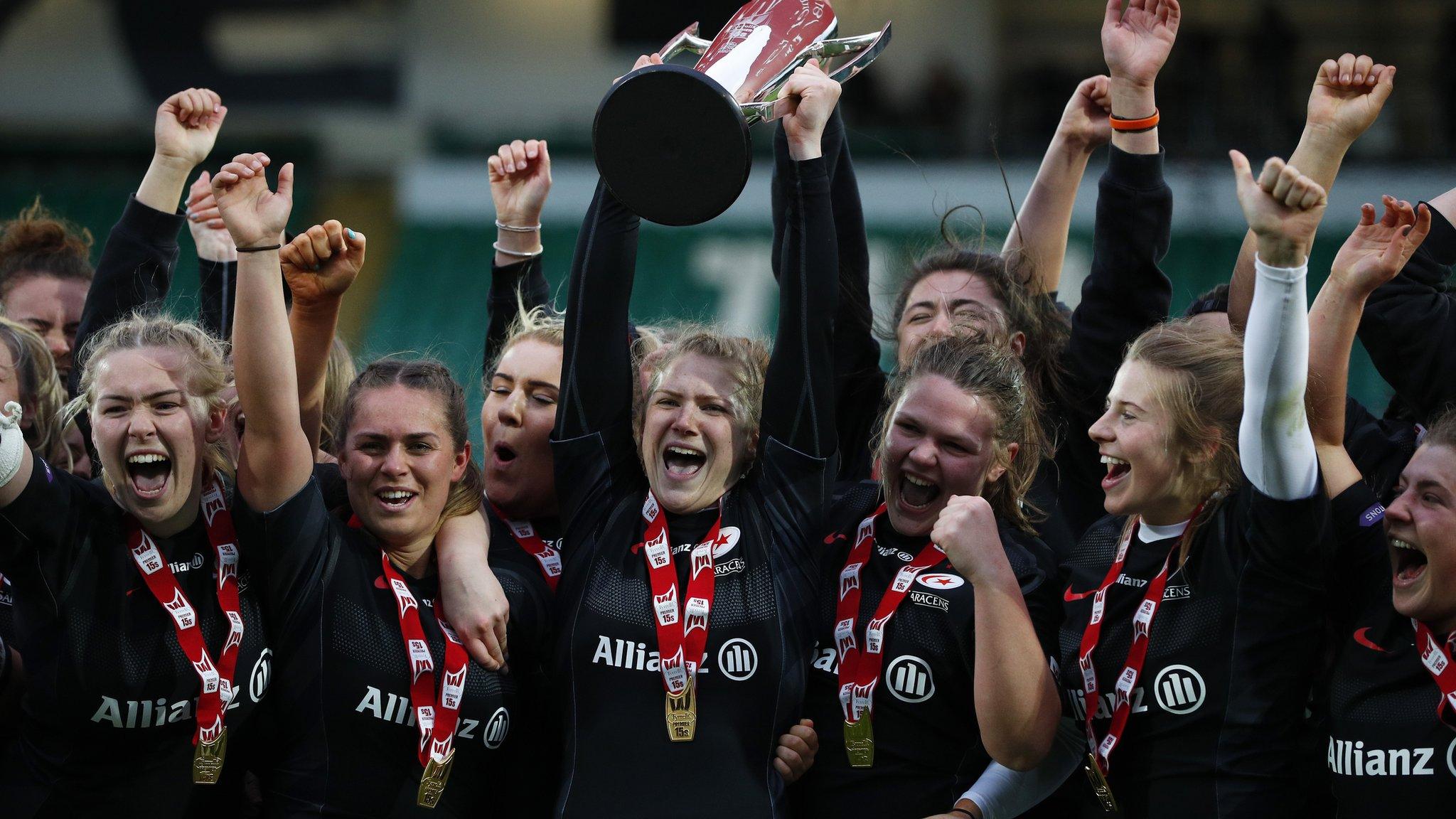 Saracens celebrate with the Premier 15s trophy