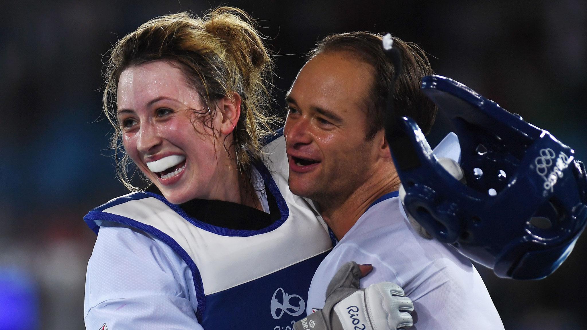 Jade Jones and her coach Paul Green celebrate after the Welsh fighter won taekwondo gold at the 2016 Olympics in Rio