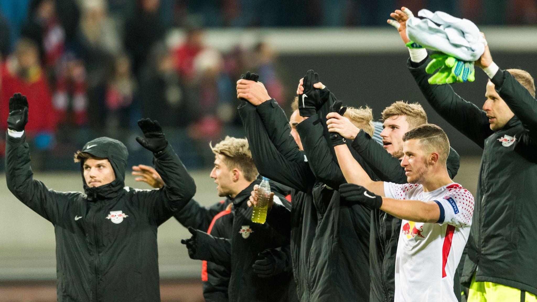 RB Leipzig players celebrate after knocking Napoli out of the Europa League.