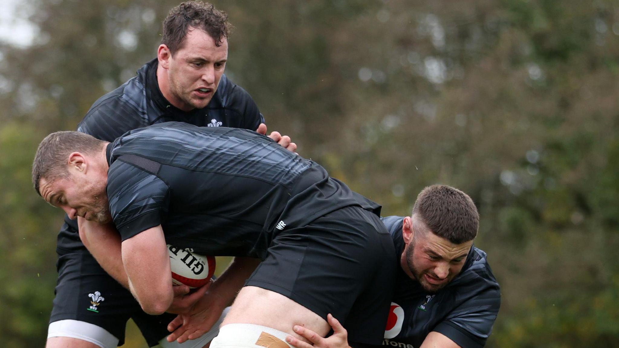 In Wales training, Ryan Elias and Gareth Thomas (right) tackles Will Rowlands