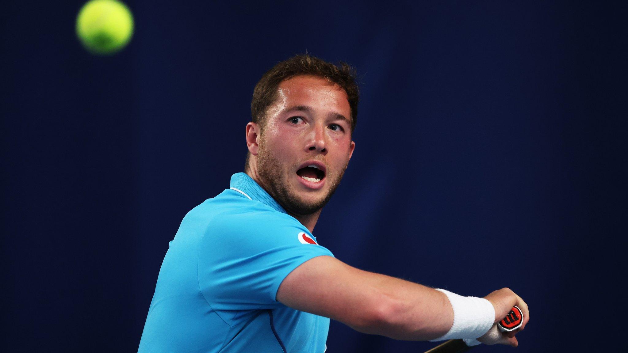 Alfie Hewett plays a shot