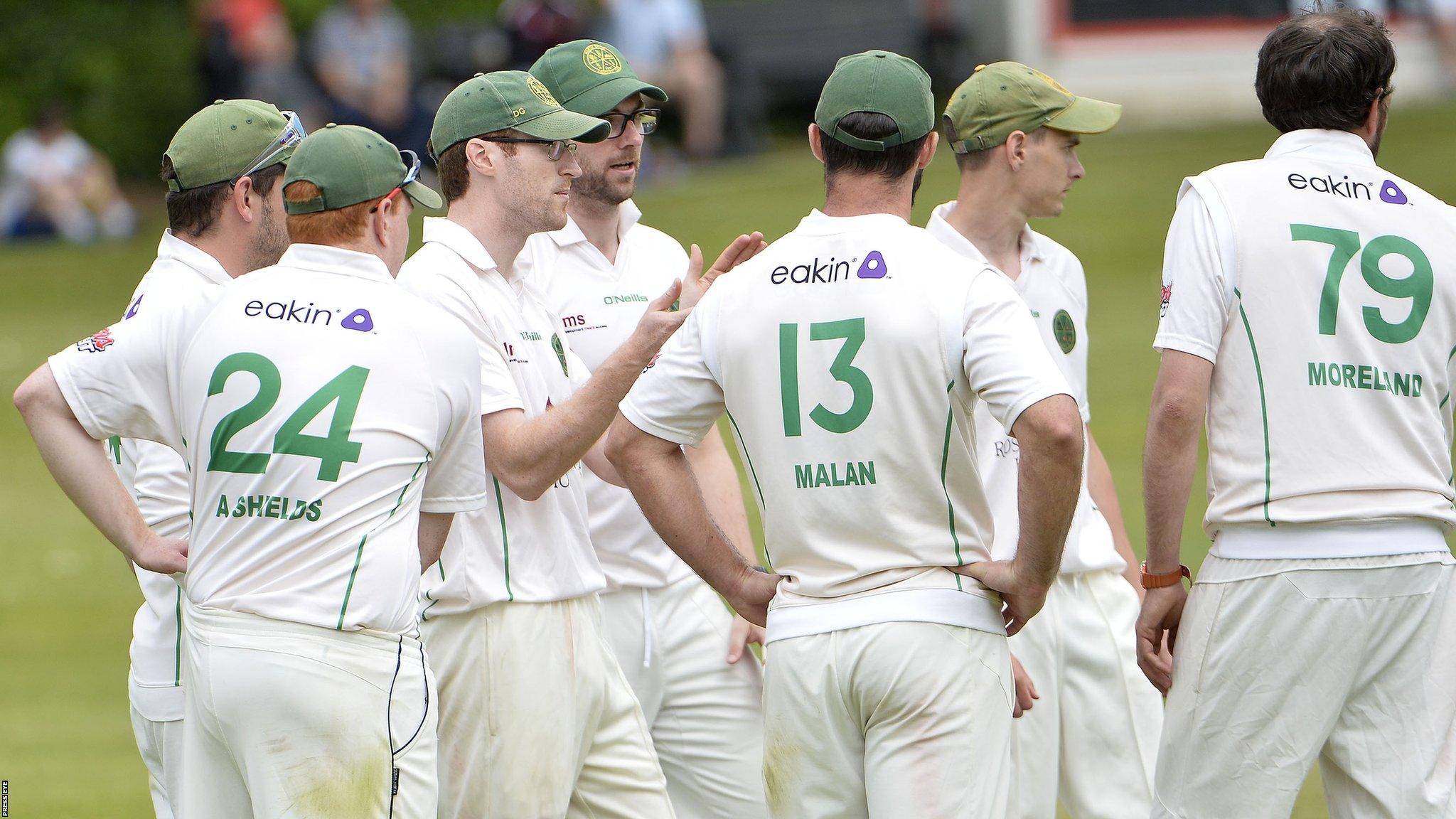 North Down celebrate taking a Derriaghy wicket