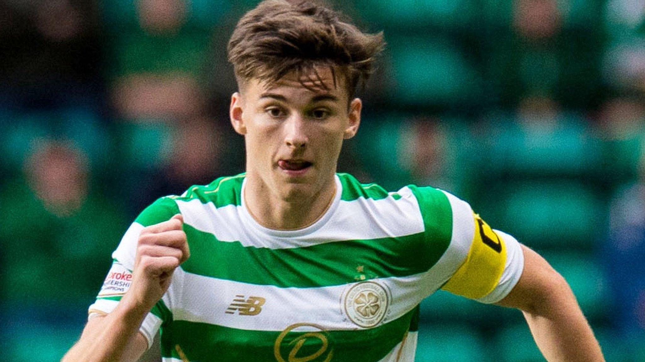 Kieran Tierney runs with the ball for Celtic