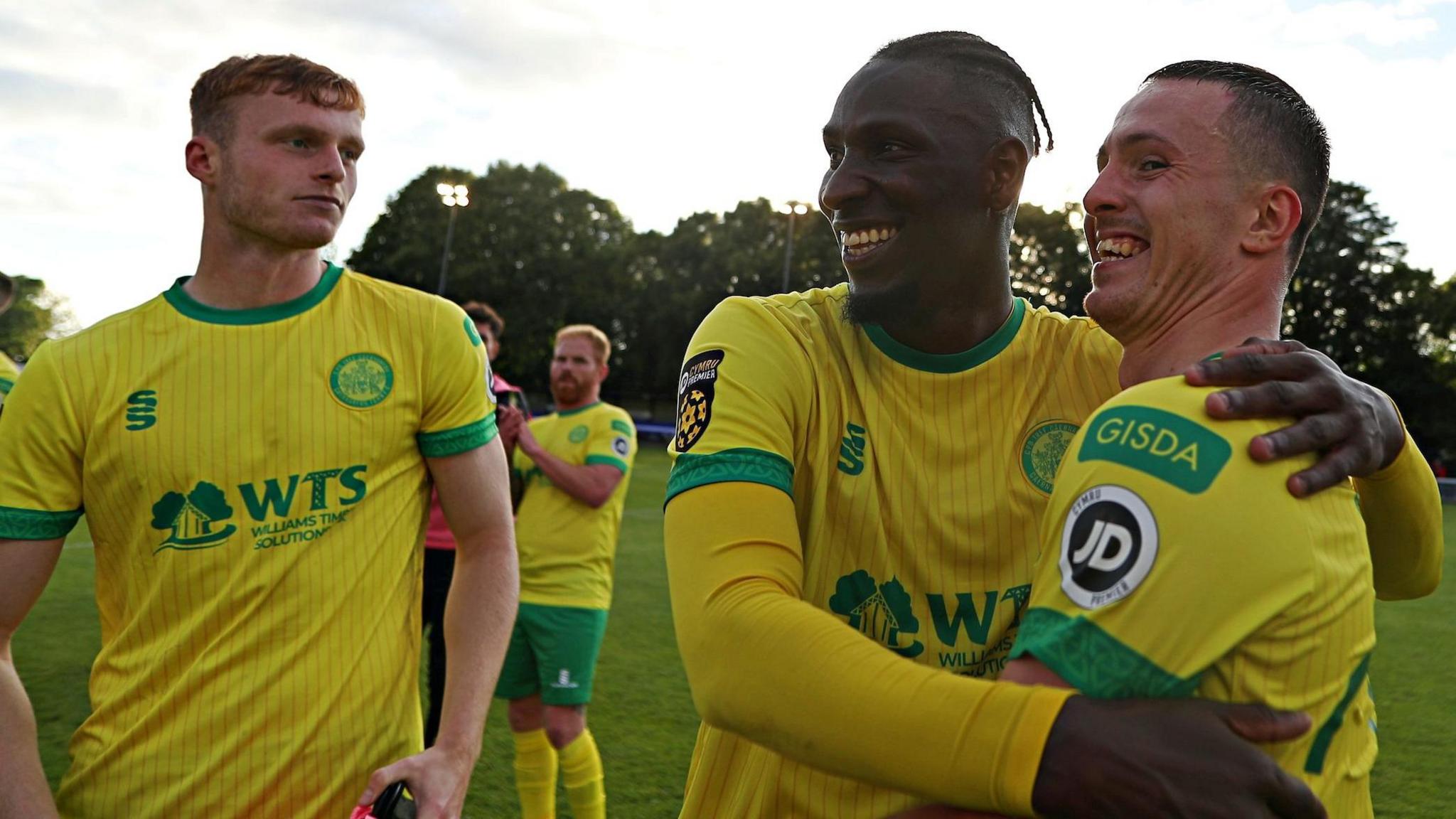 Caernarfon players celebrate their 2-0 first qualifying round, first leg win over Crusaders