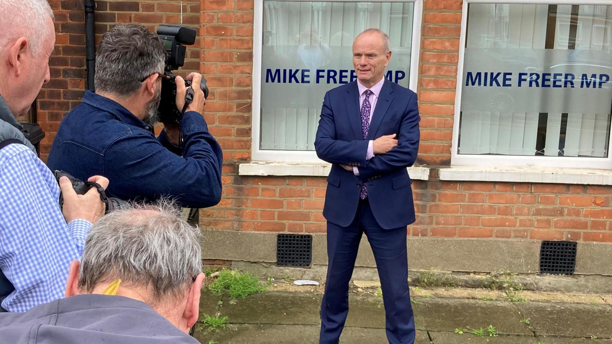 Conservative MP for Finchley and Golders Green, Mike Freer, outside his office at the reopening following the fire