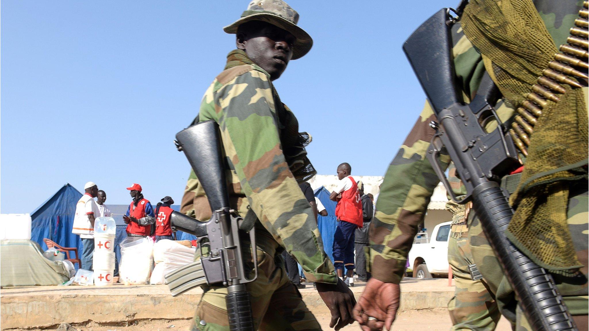 Senegalese soldiers patrol near a camp of the Red Cross in Karang, Senegal, near the border with The Gambia, on January 20, 2017