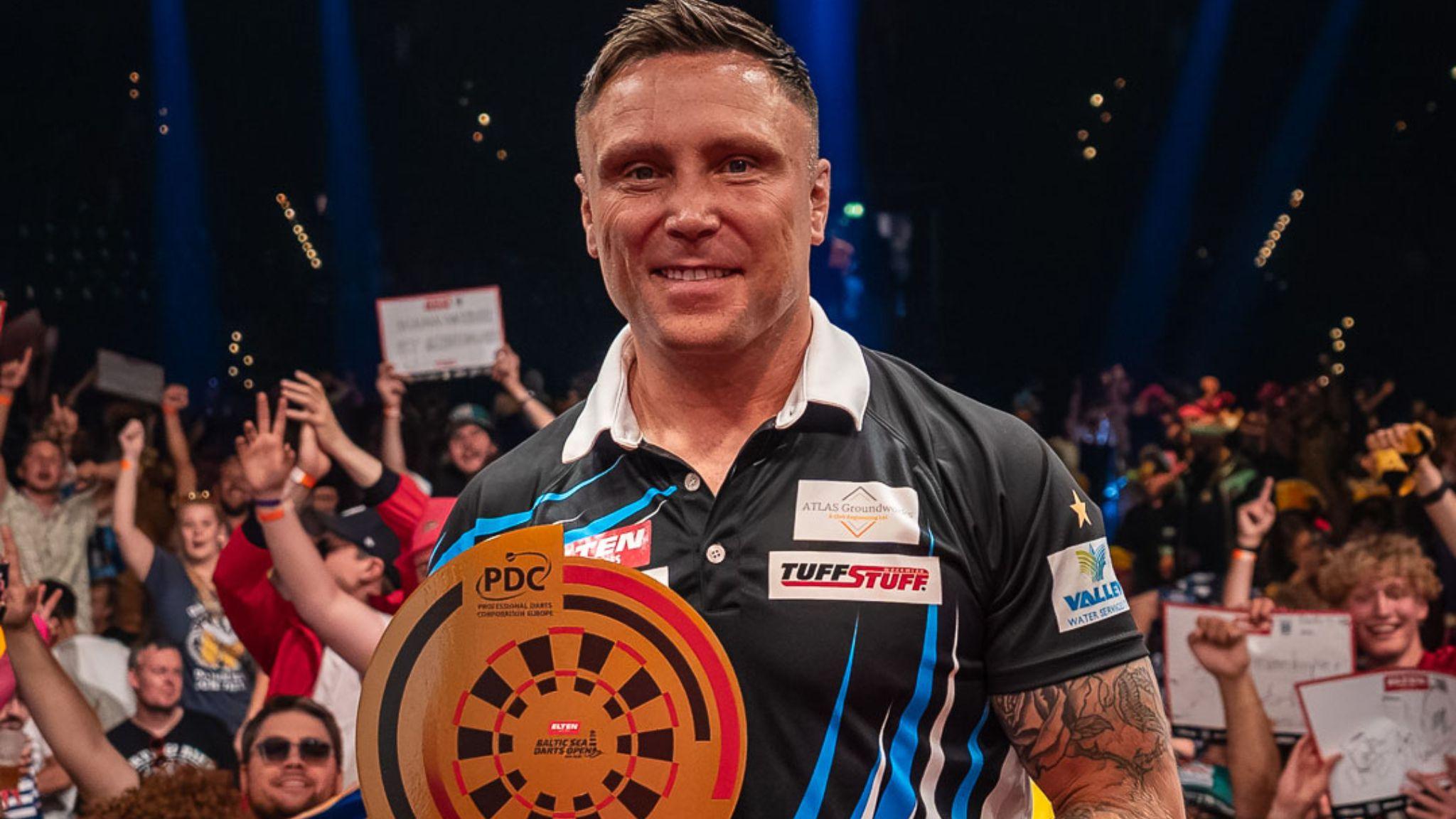 Gerwyn Price holds the Baltic Sea Darts Open trophy