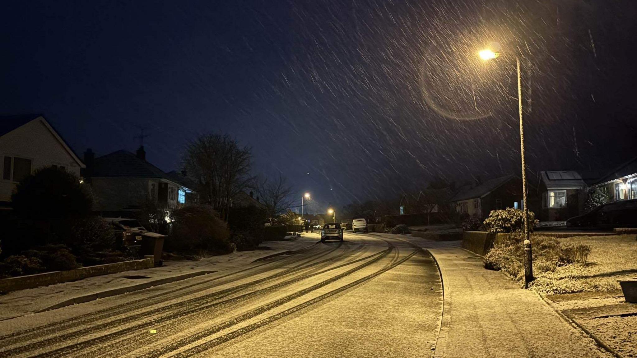 Snow covering a street in Cranbrook