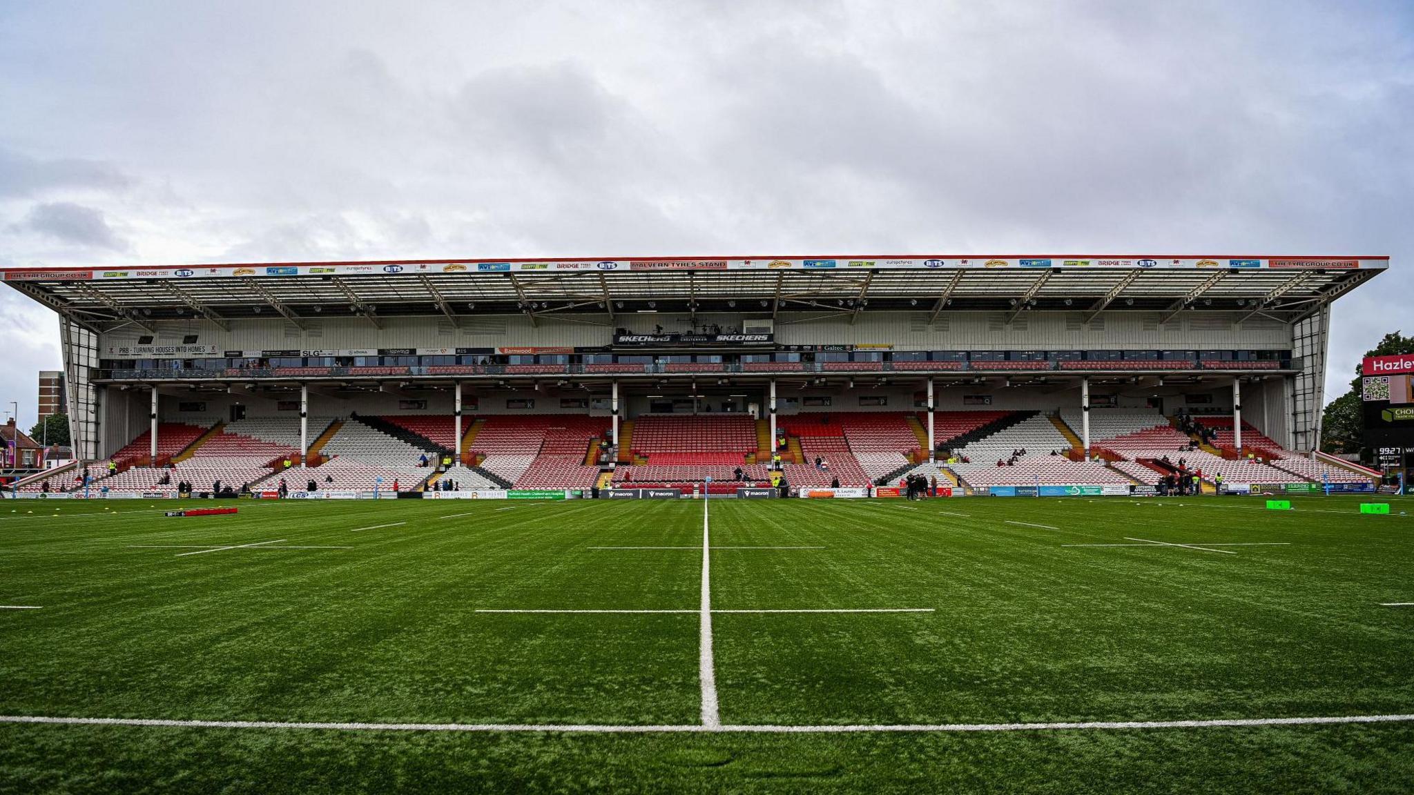 A general view across the pitch of a stand at Kingsholm stadium