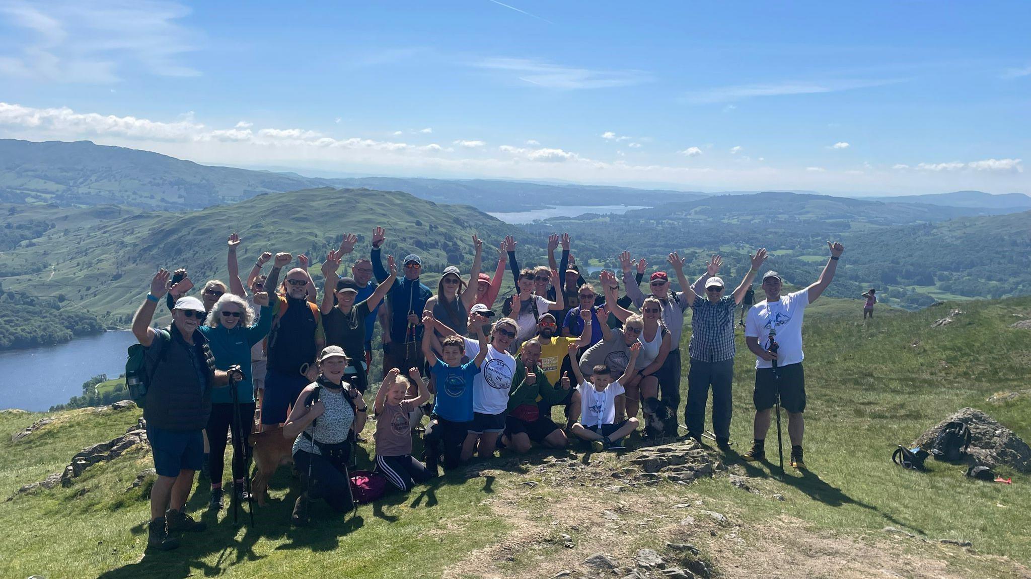 Leo and fellow hikers at the peak on Sunday