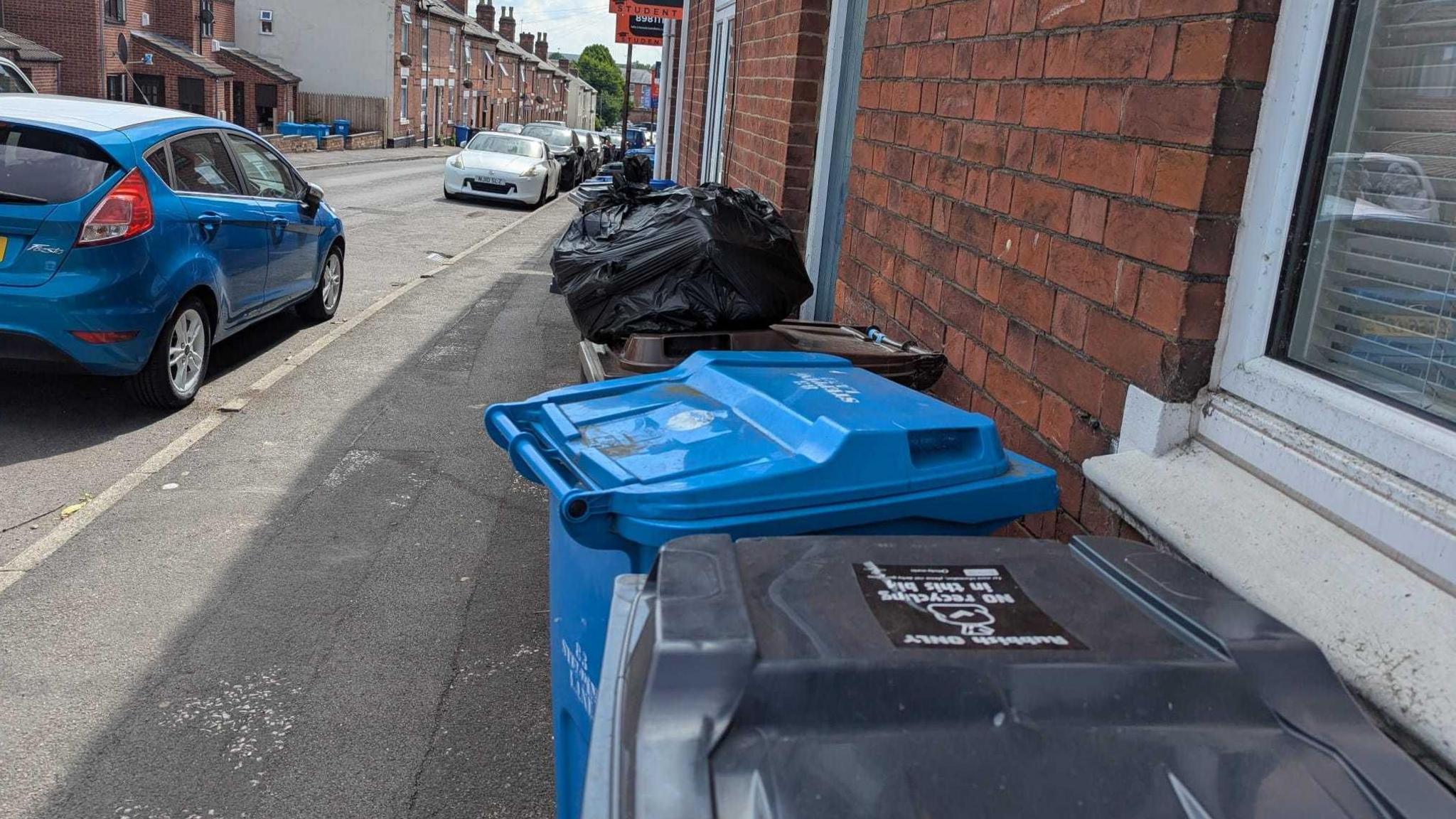 Bins left outside homes in Derby