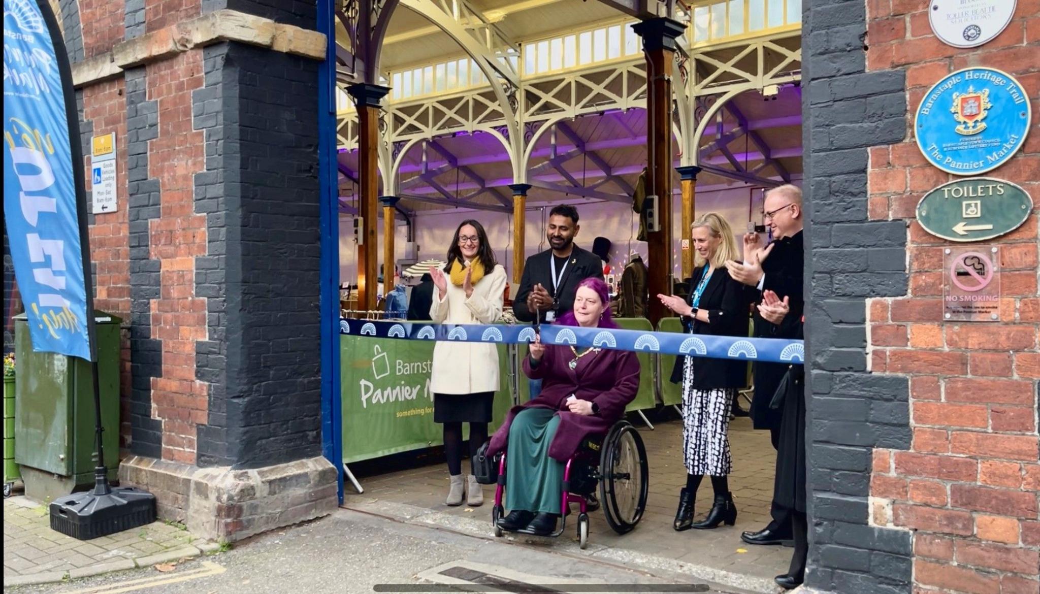 Ribbon cutting at the pannier market