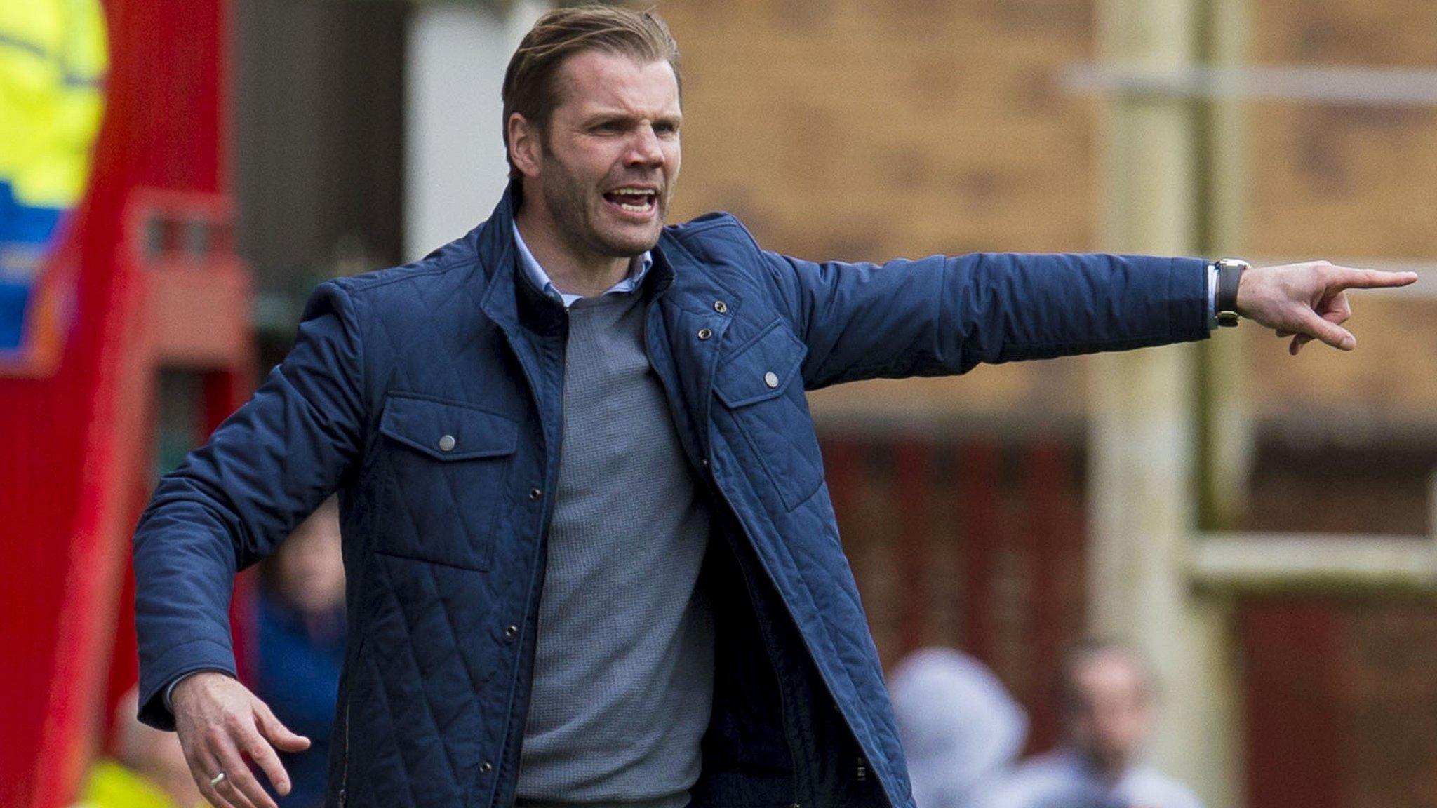 Hearts head coach Robbie Neilson shouts out orders to his players