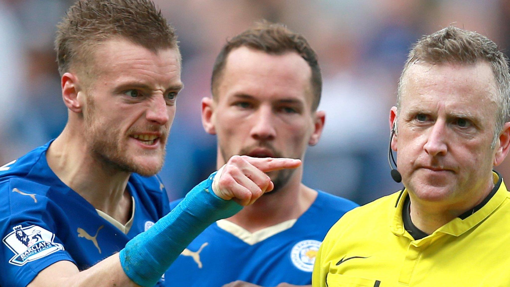 Leicester striker Jamie Vardy gestures at referee Jon Moss after his red card