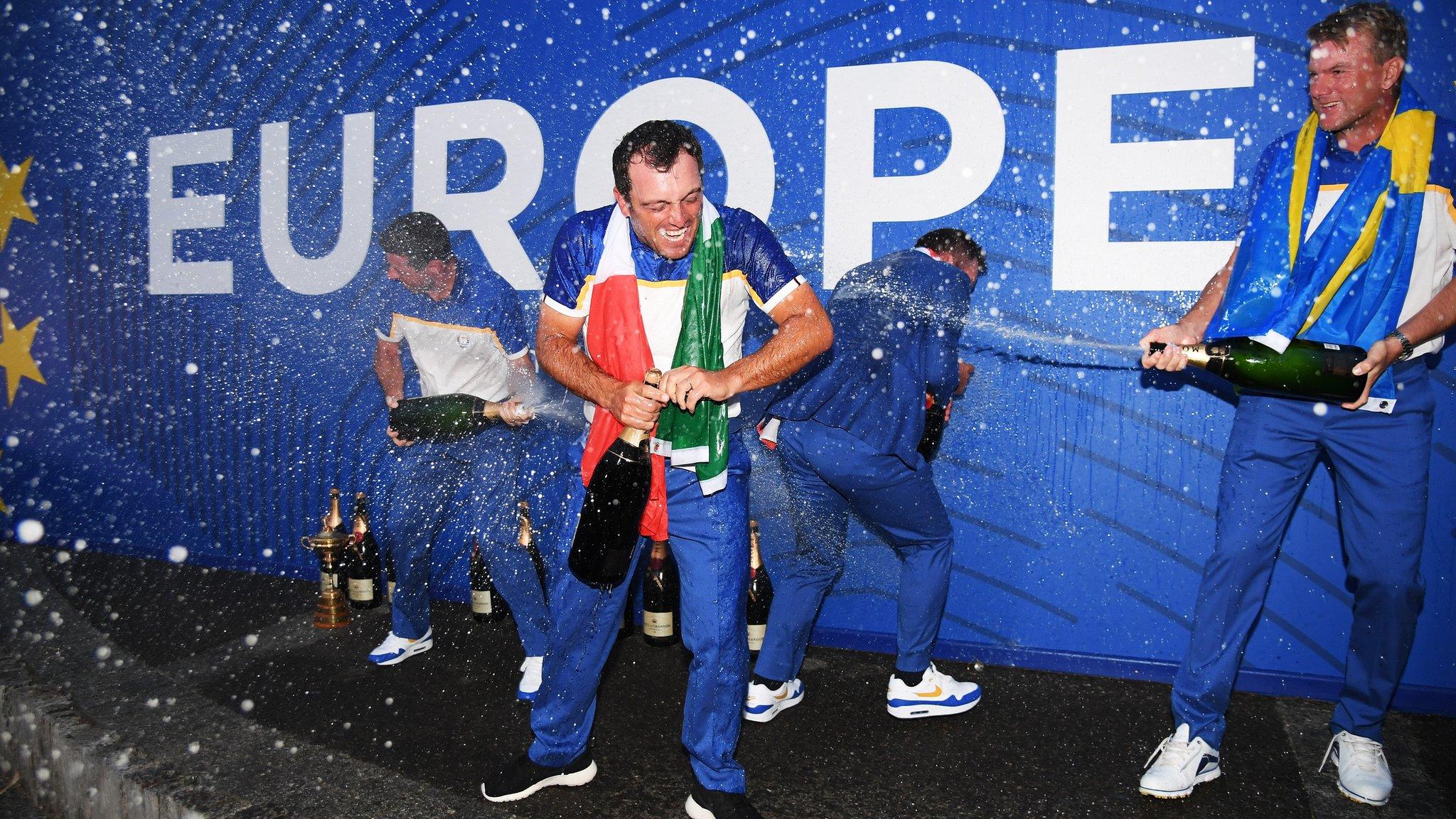 Europe's Francesco Molinari sprays champagne as he celebrates winning the Ryder Cup at Le Golf National