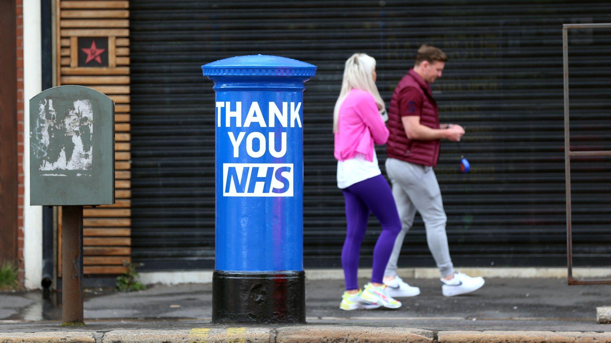 NHS painted post box on the Falls Road in west Belfast