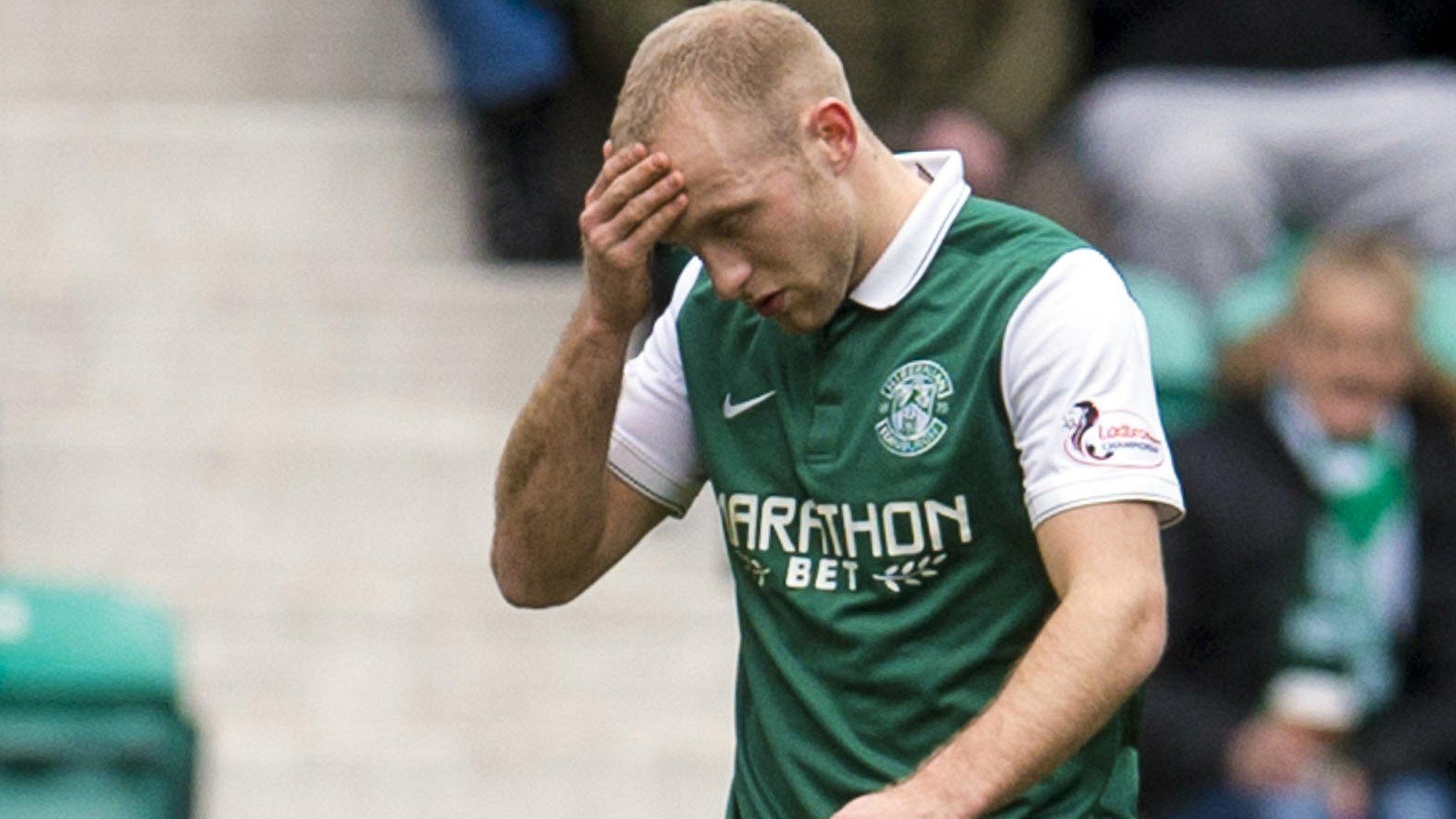 Hibs midfielder Dylan McGeouch trudges off during their Scottish cup quarter-final against Inverness