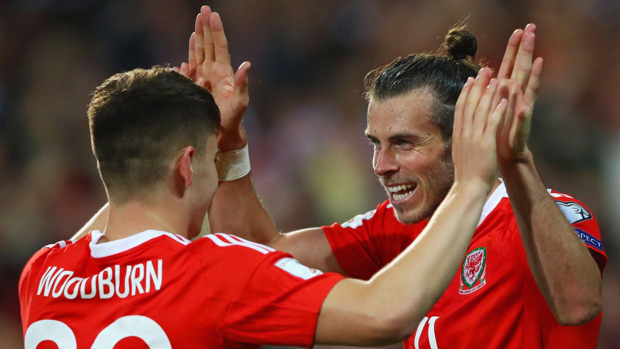 Ben Woodburn (left) with Gareth Bale