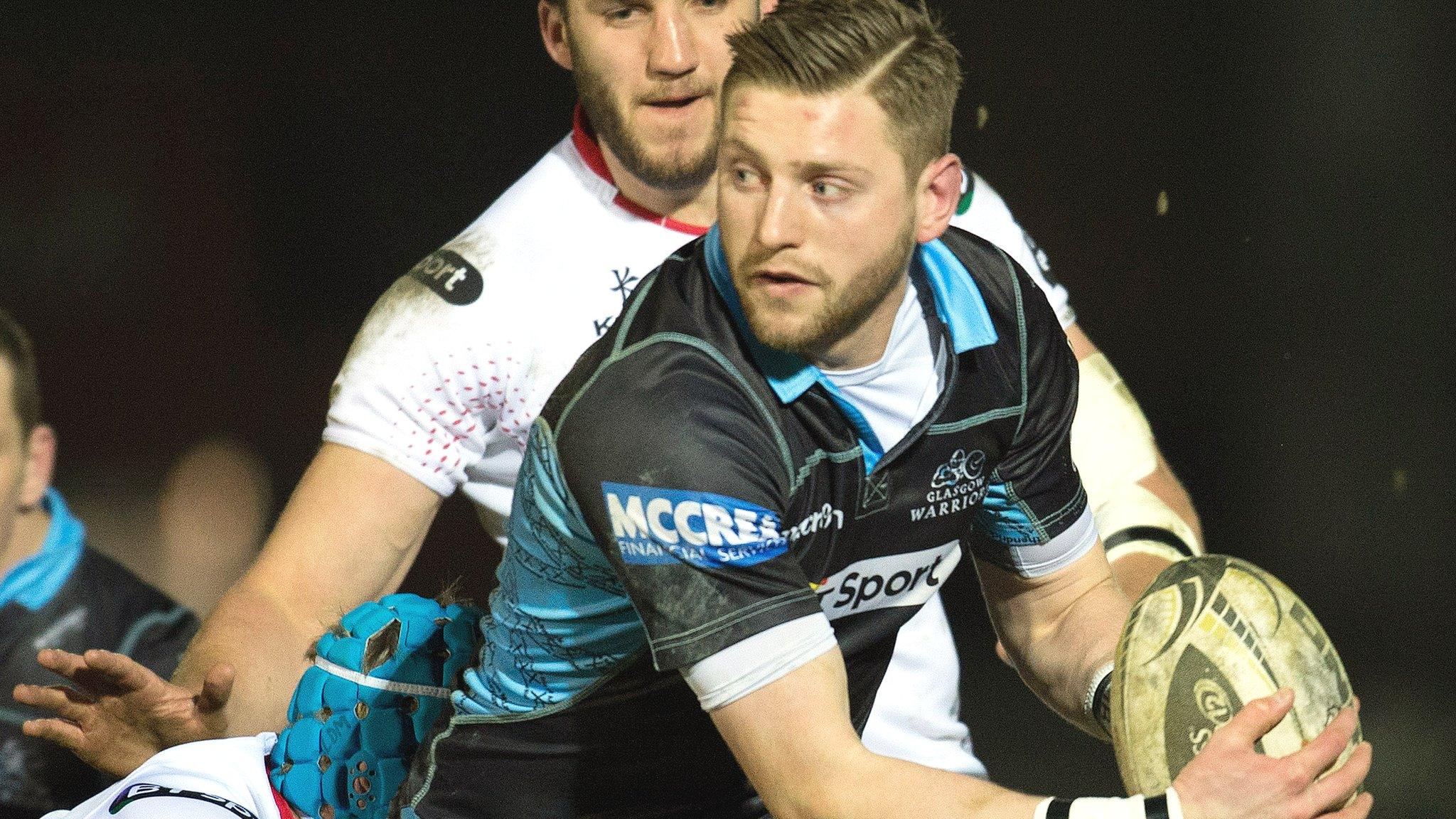 Finn Russell in action for Glasgow