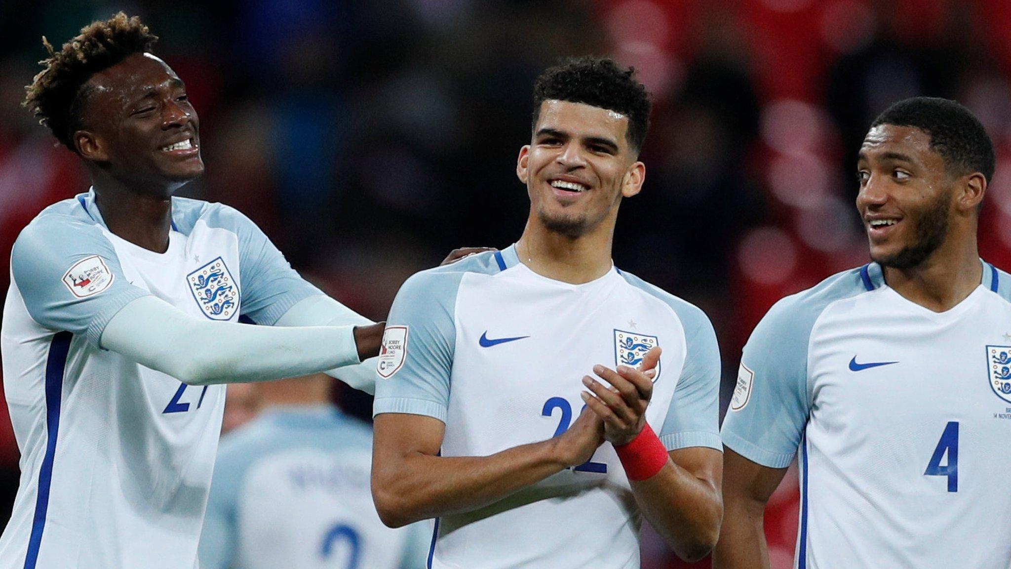 Tammy Abraham, Dominic Solanke & Joe Gomez celebrate England's draw