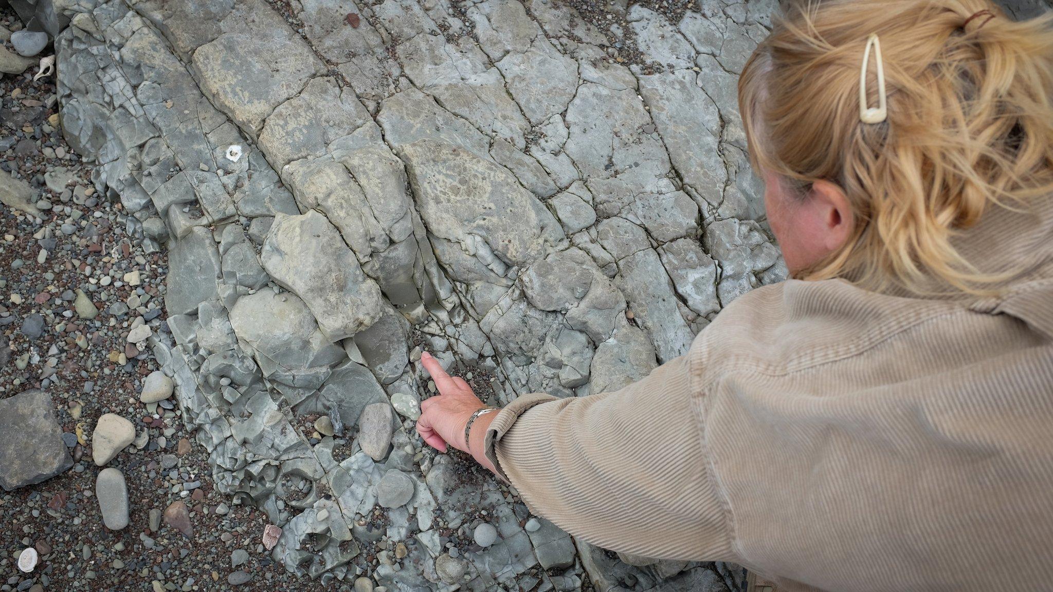 Cindy Howells and one of the foot prints