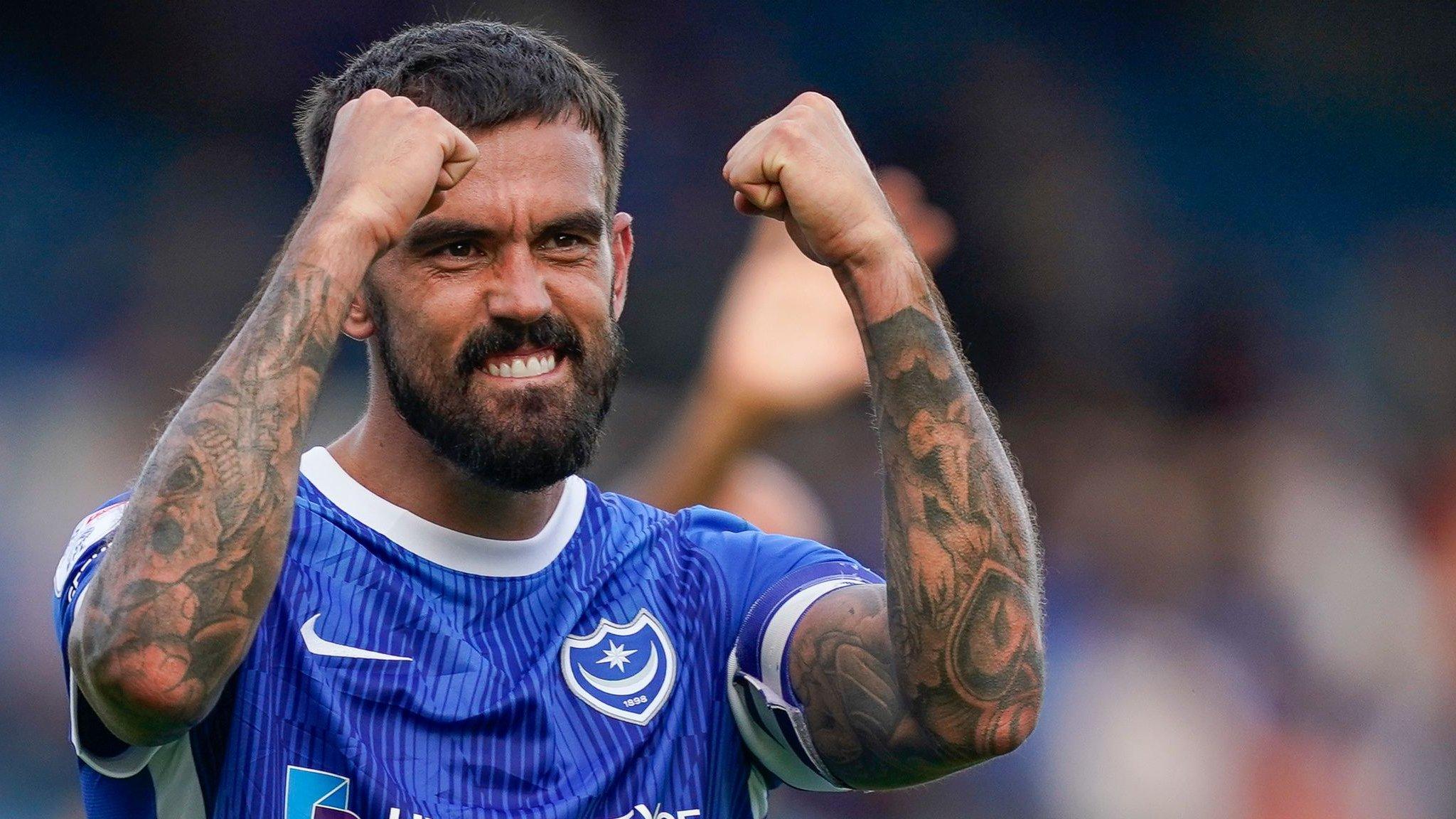 Portsmouth midfielder Marlon Pack celebrates after a League One victory.