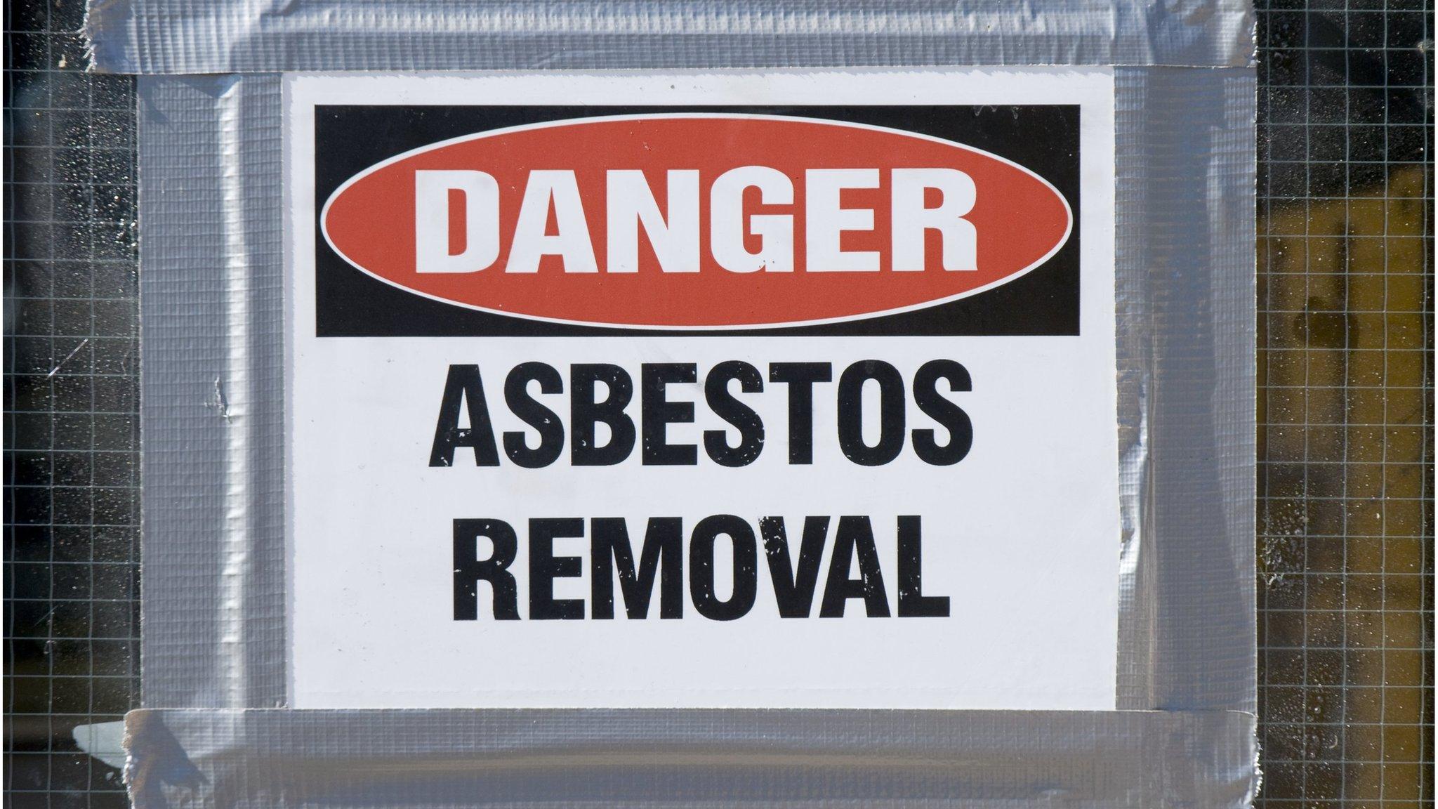 A picture of danger asbestos removal sign