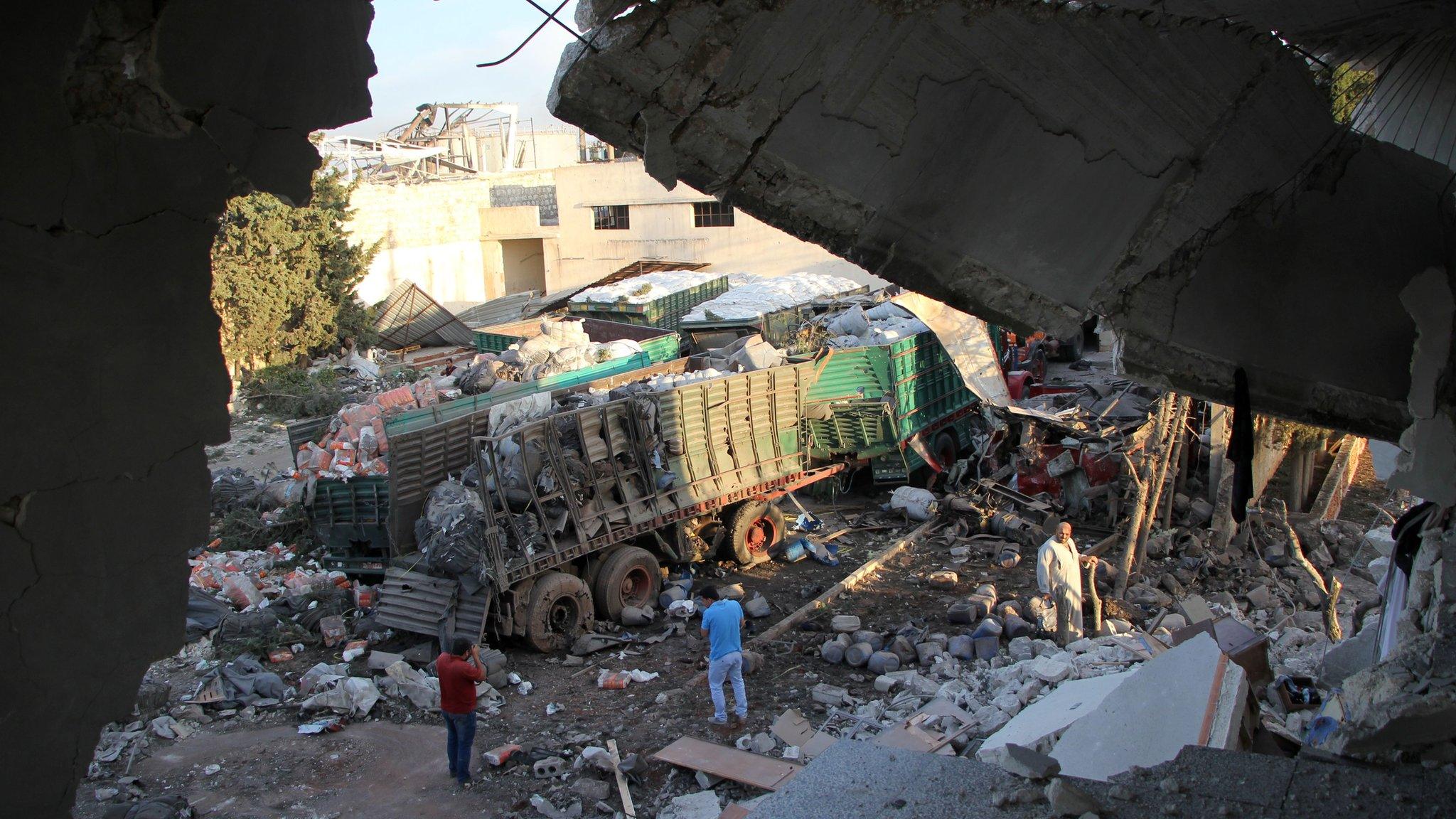 Aid is strewn across the floor in the town of Orum al-Kubra on the western outskirts of the northern Syrian city of Aleppo, 20 September 2016