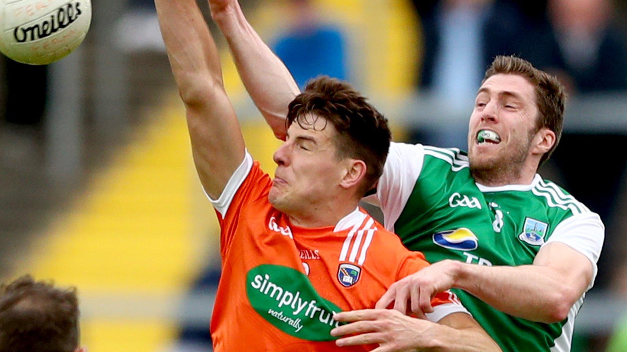 Armagh's Niall Grimley beats Eoin Donnelly to the high ball