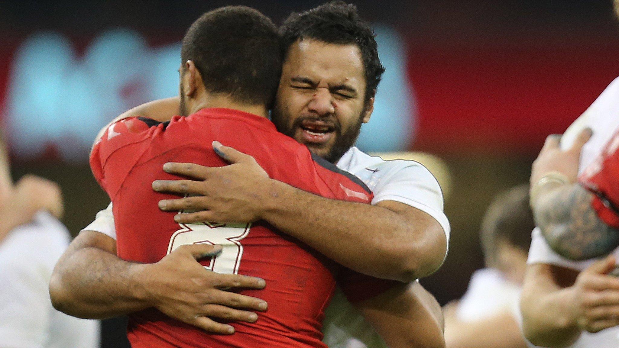 Billy Vunipola and Taulupe Faletau hug at the end of a match