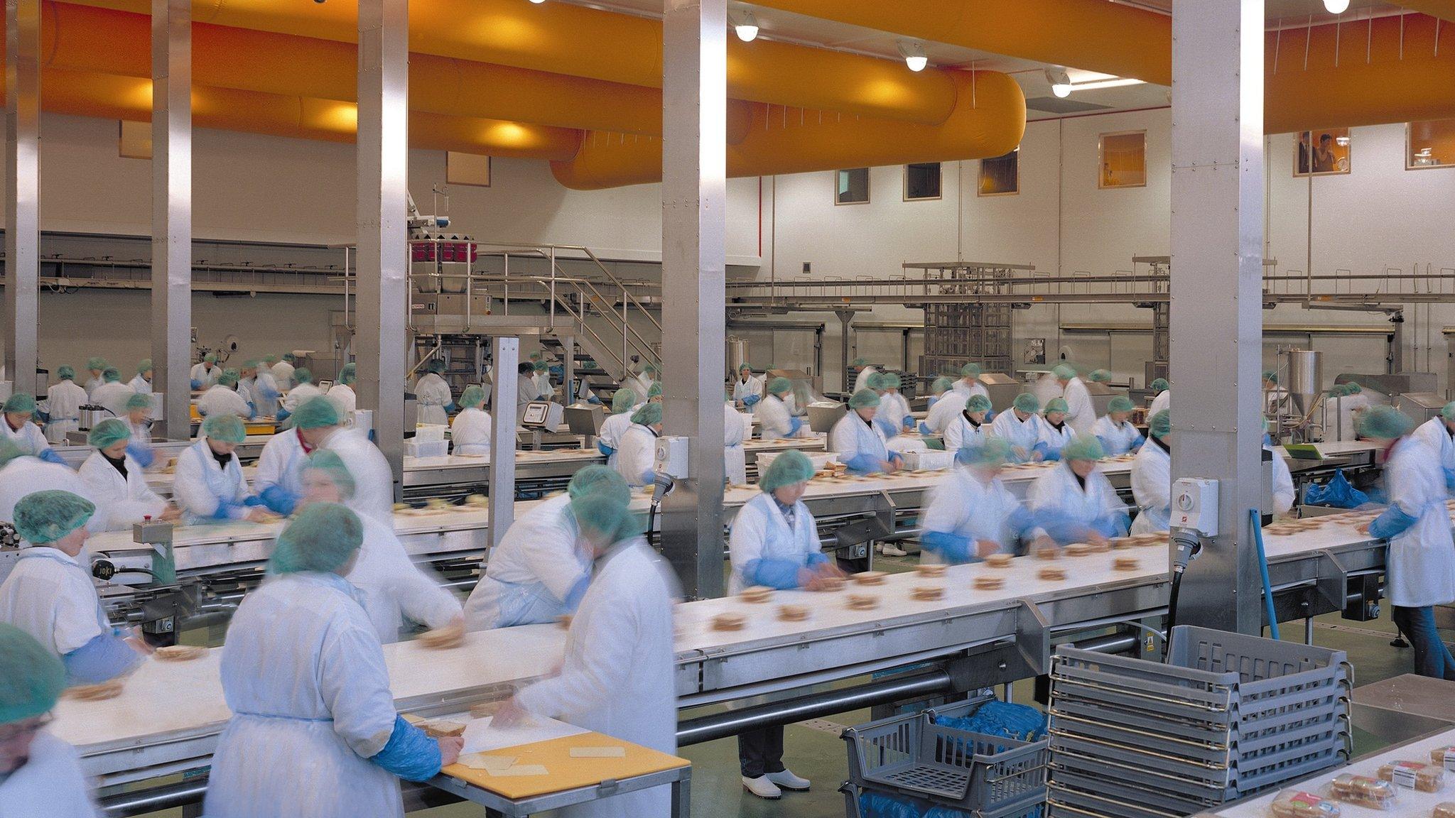 Workers in a Greencorp sandwich factory