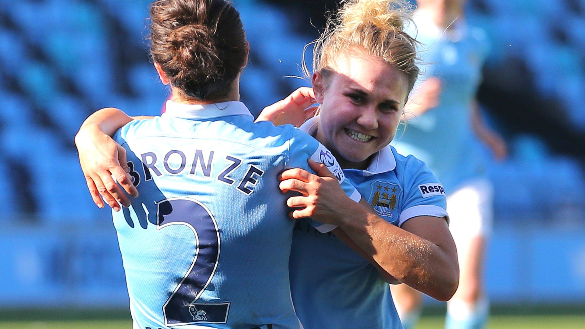 Manchester City's Lucy Bronze celebrates scoring her sides third goal with Isobel Christiansen (right)