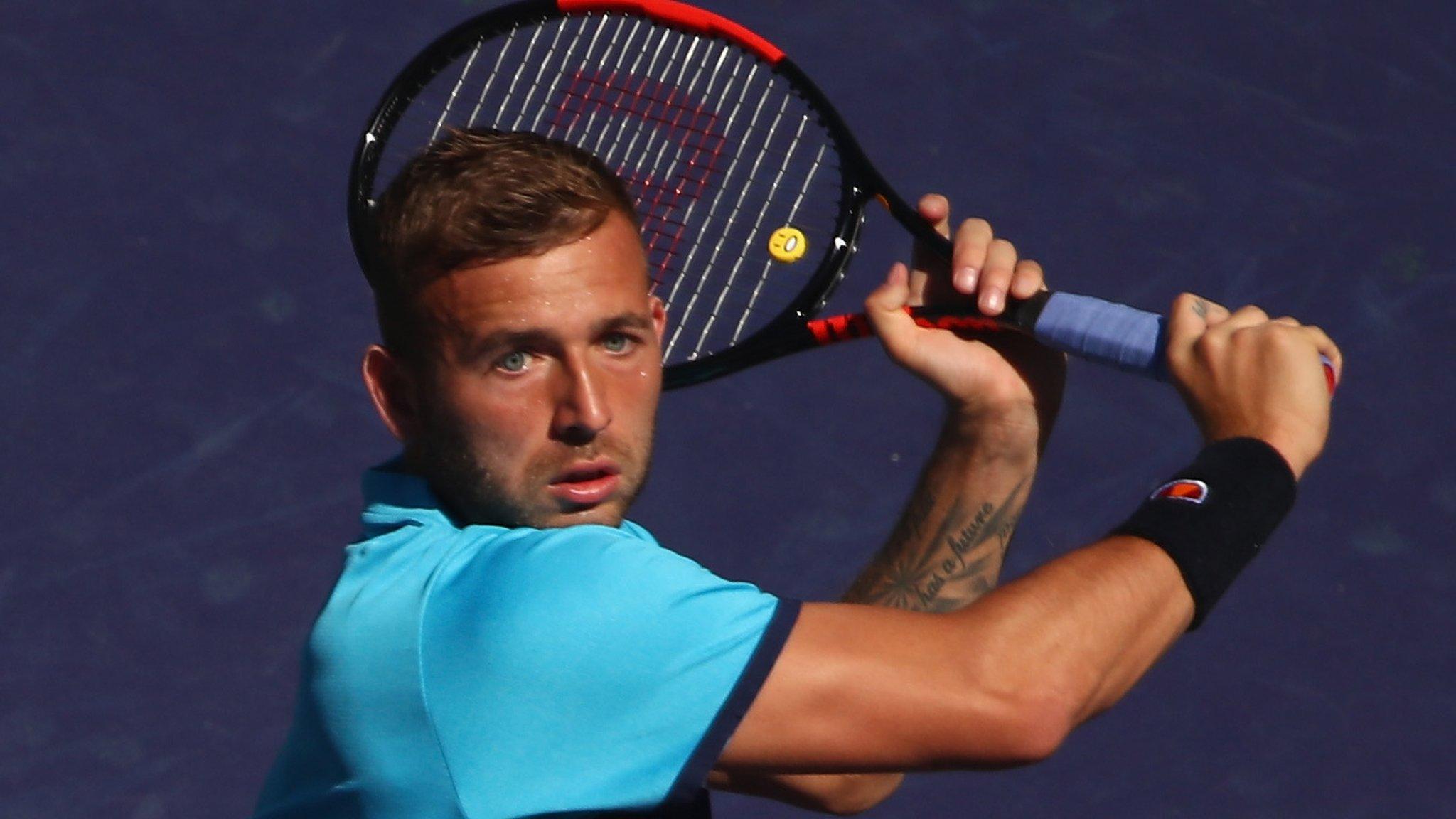 Dan Evans in action against Kei Nishikori