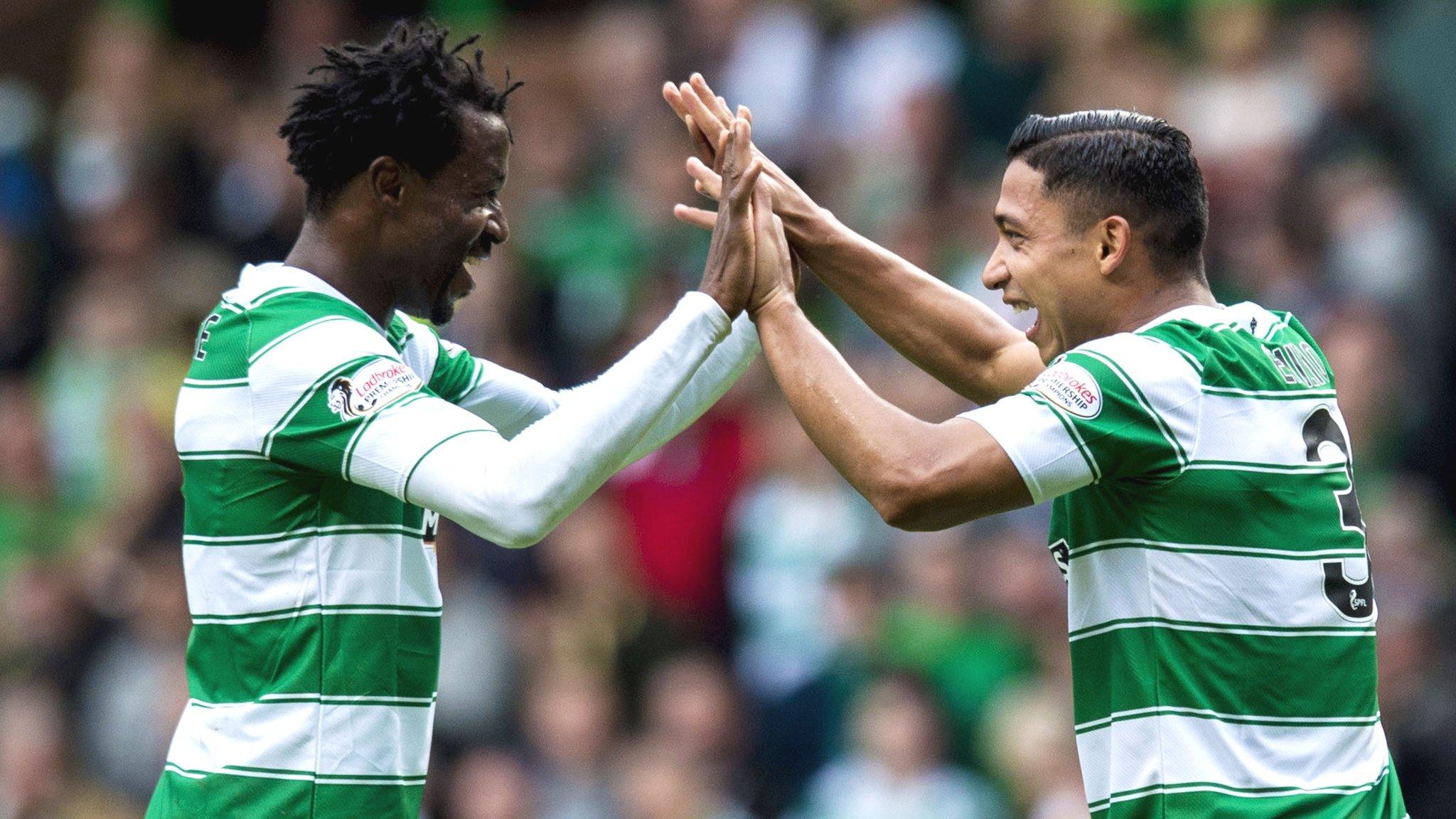 Emilio Izaguirre celebrates with Celtic team-mate Efe Ambrose