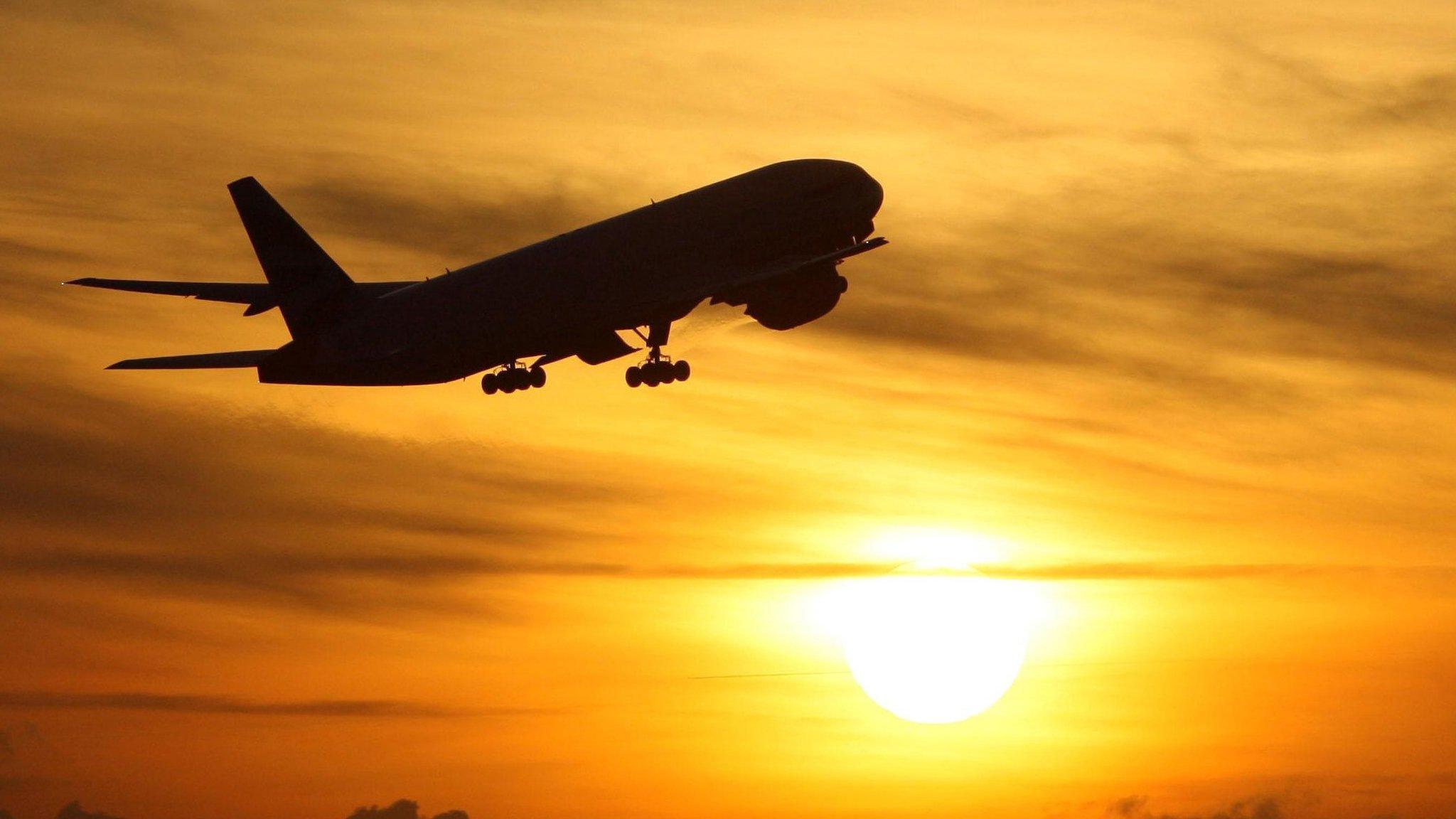 Plane and sunset