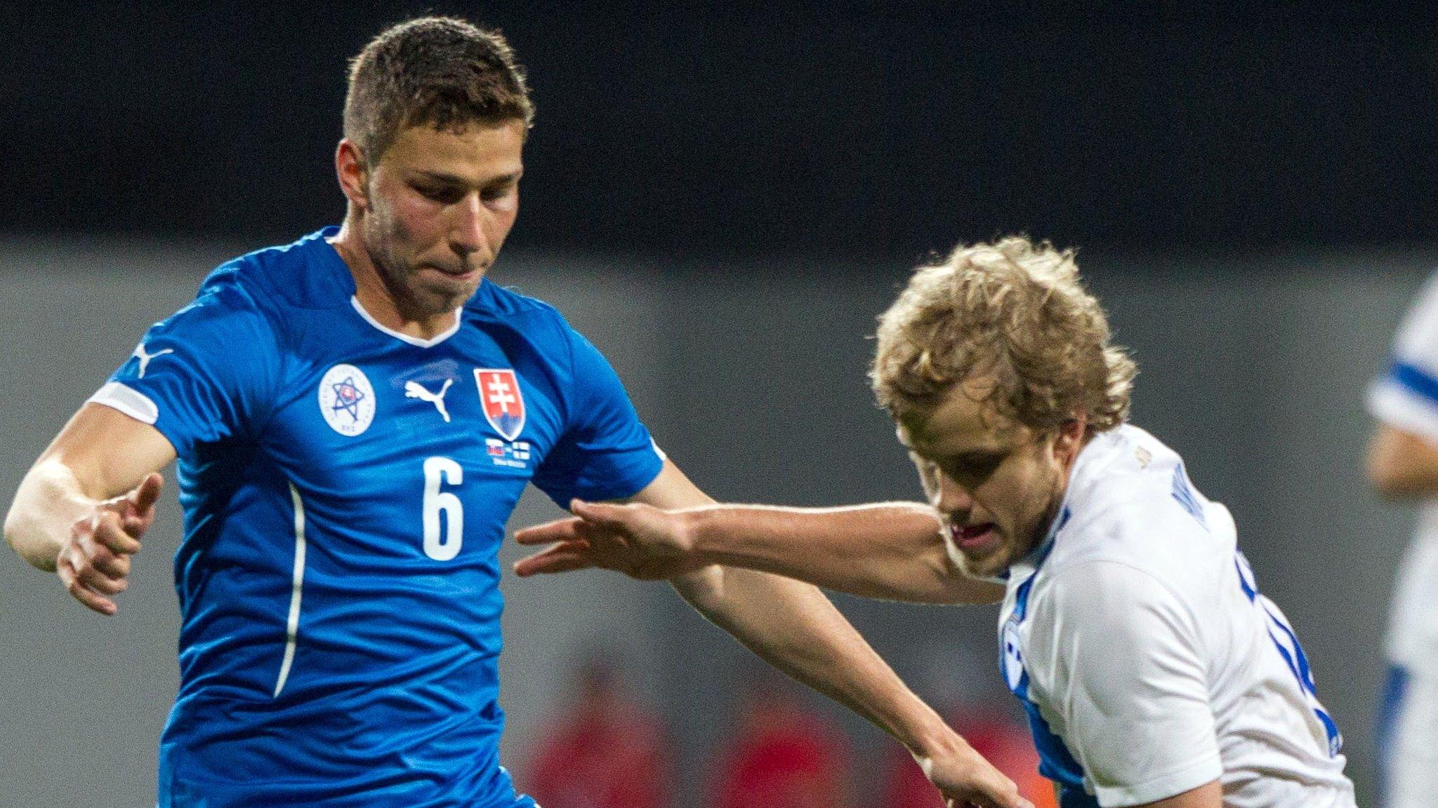 Filip Kiss (left) in action for Slovakia