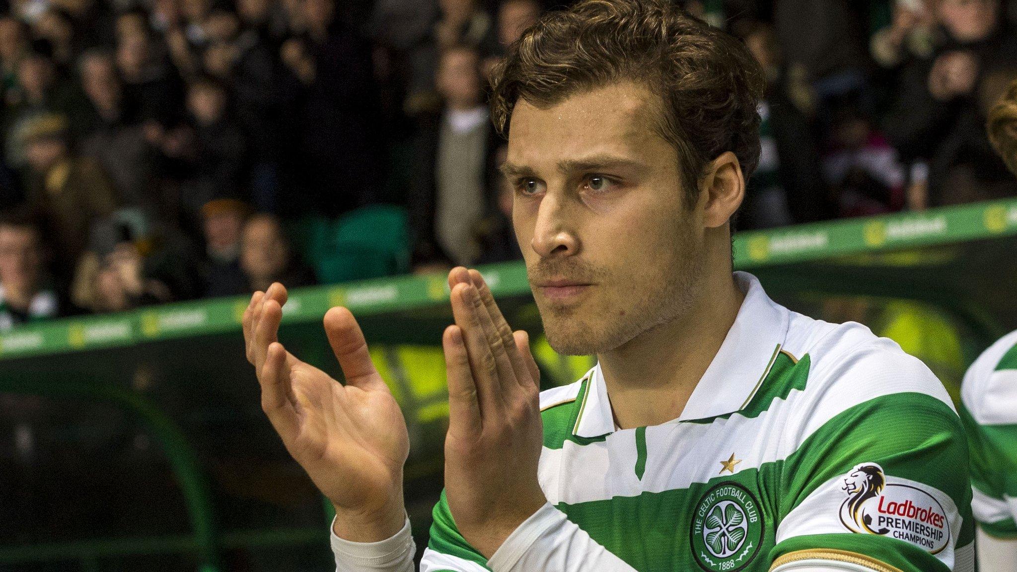 Erik Sviatchenko applauds Celtic supporters