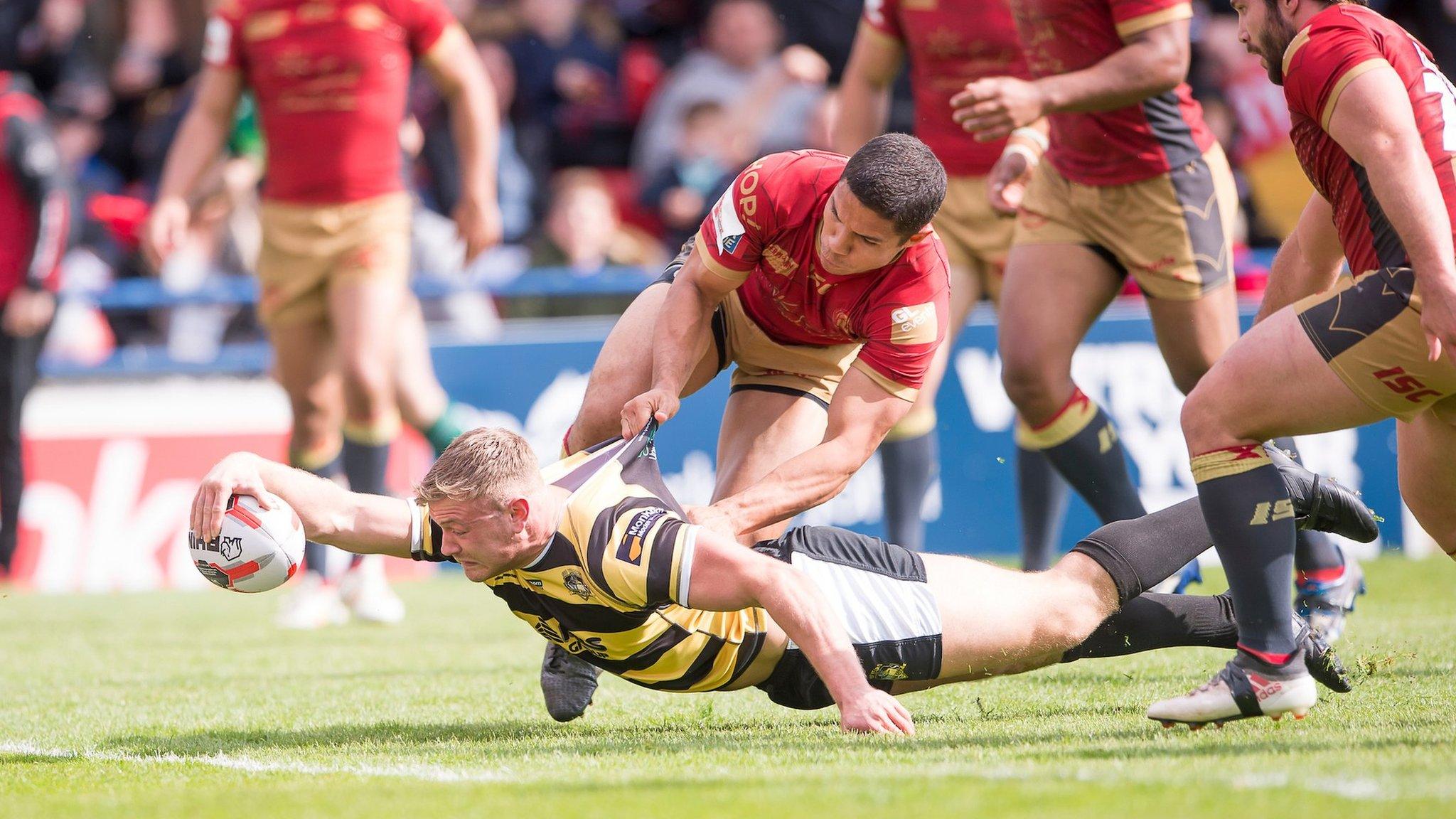 Joe Porter stretches across for York