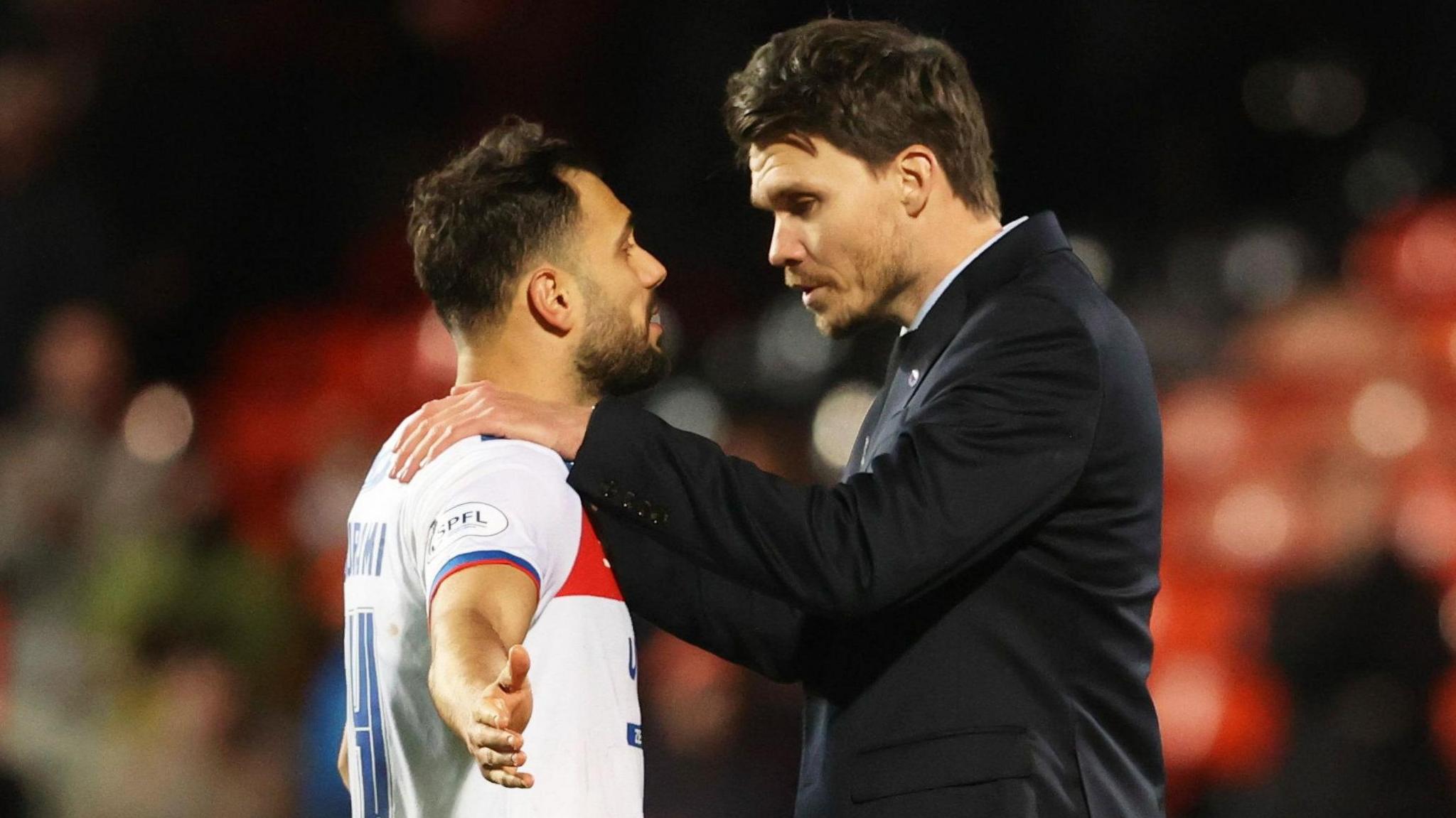 Rangers midfielder Nedim Bajrami and head coach Danny Rohl